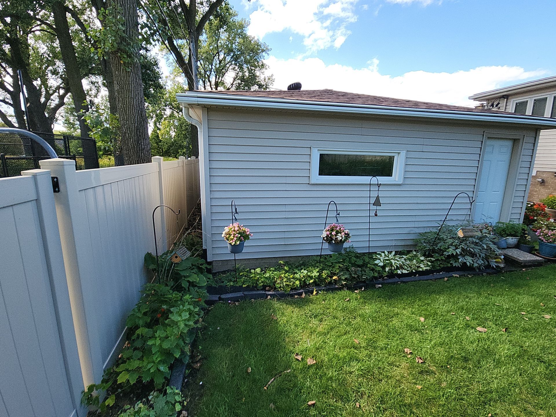 Exterior House, Detached Garage & Window Cleaning by Northern Power Washing LLC.