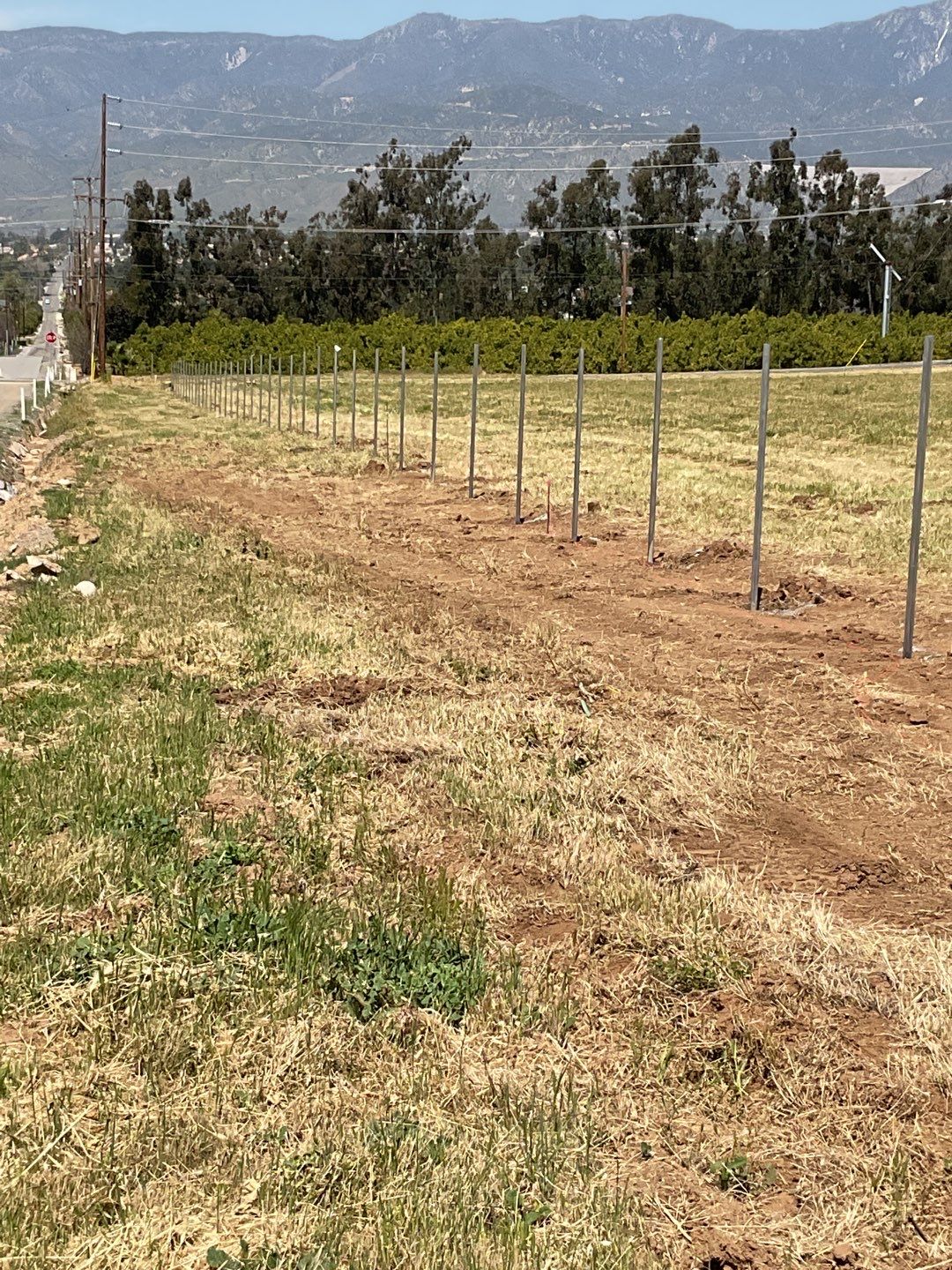Fence installation using chain link wire by Fence Guys Inc. 