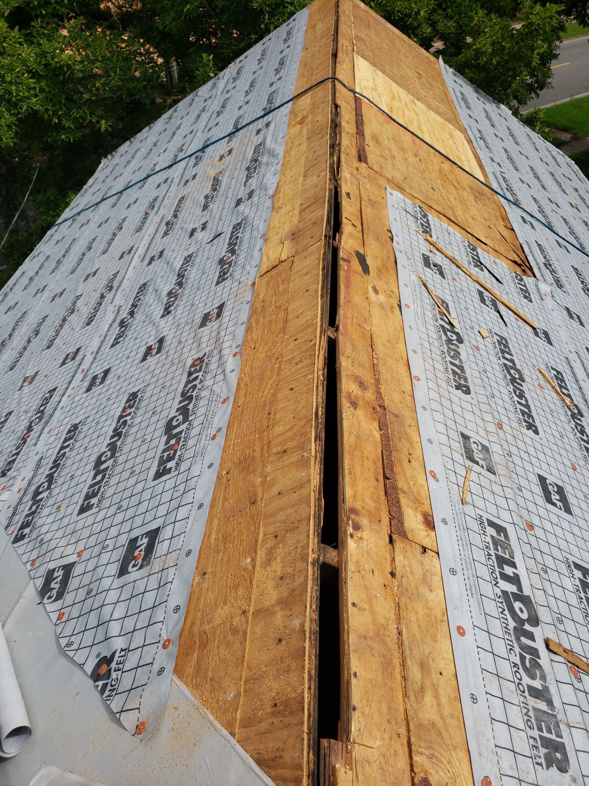 Residential Roofing Installation using Roof Replacement by American Roofing & Construction LLC