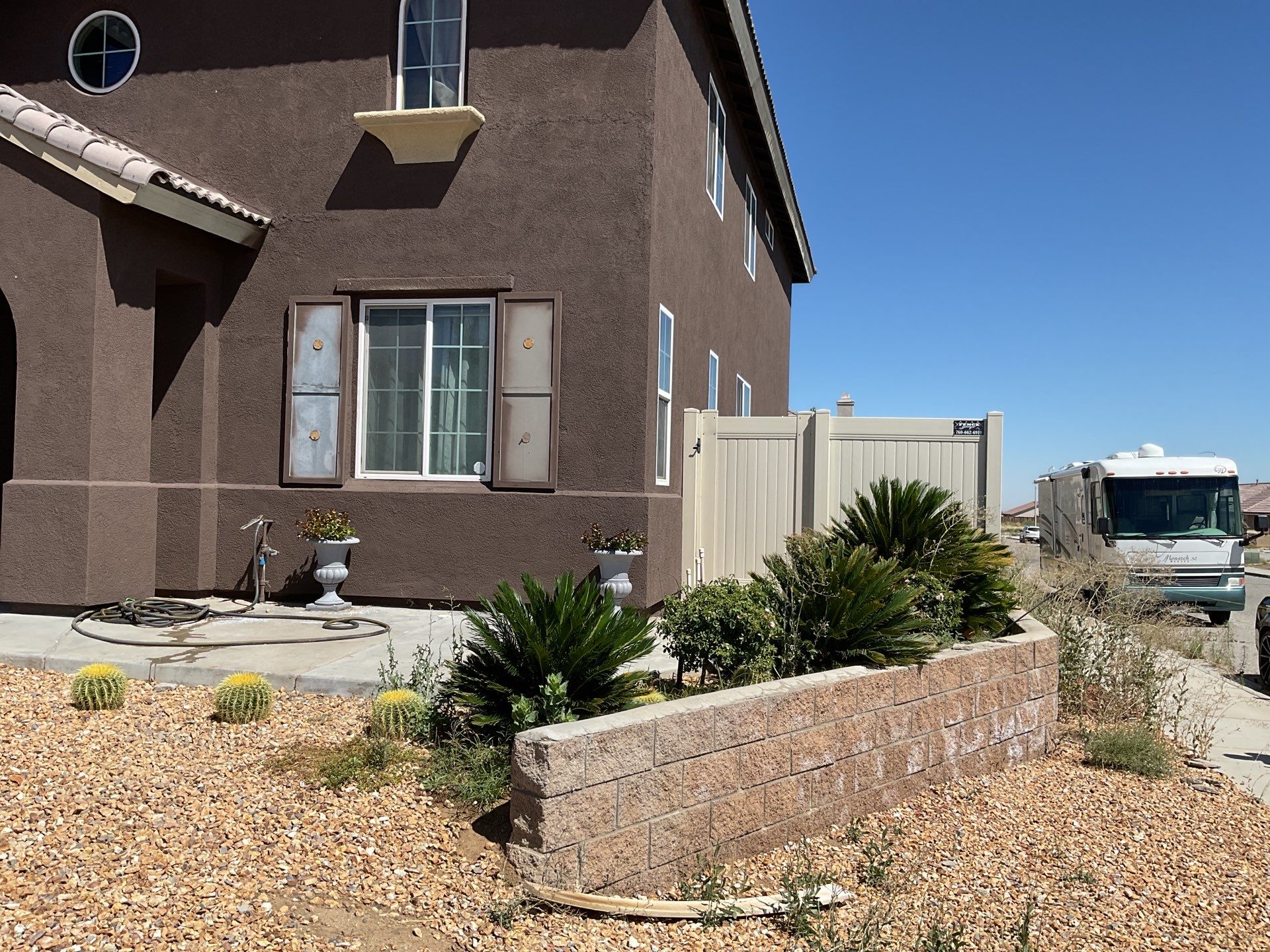 Tan Vinyl by Fence Guys Inc. 