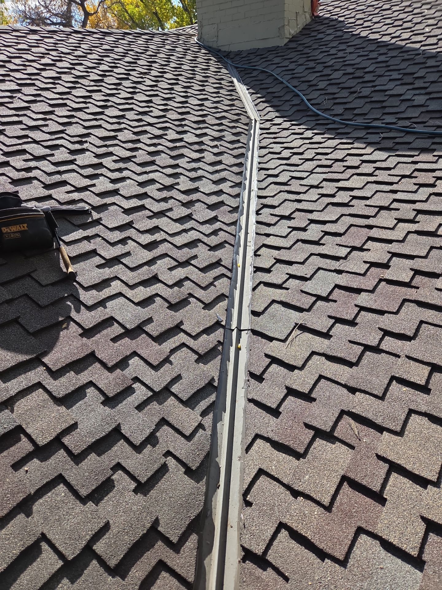 Valley leak repair by RTP Roofing Company