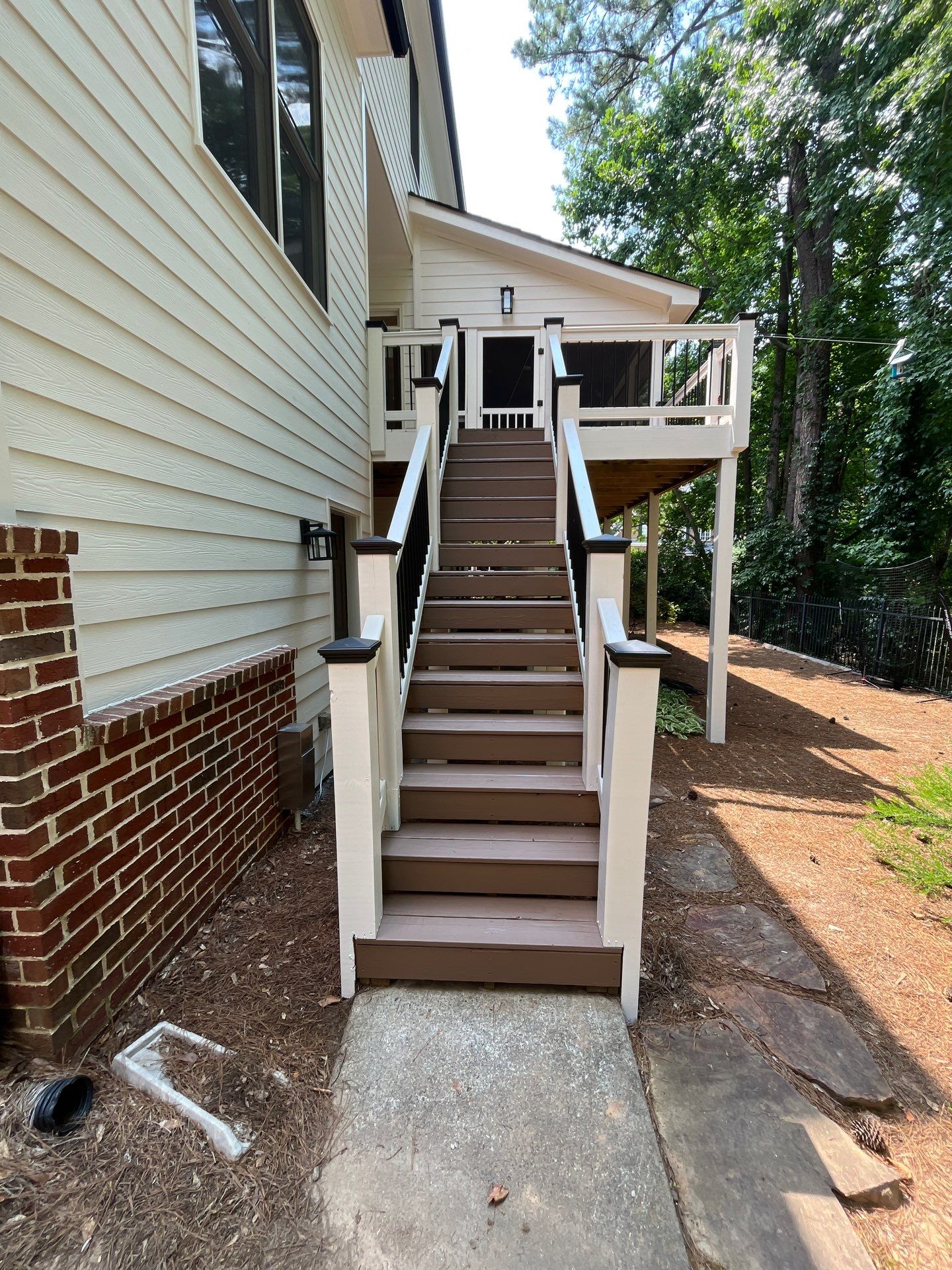 Deck Stain and Rotten Wood Replacement with James Hardie and Sherwin-Williams Products by Nelson Exteriors 