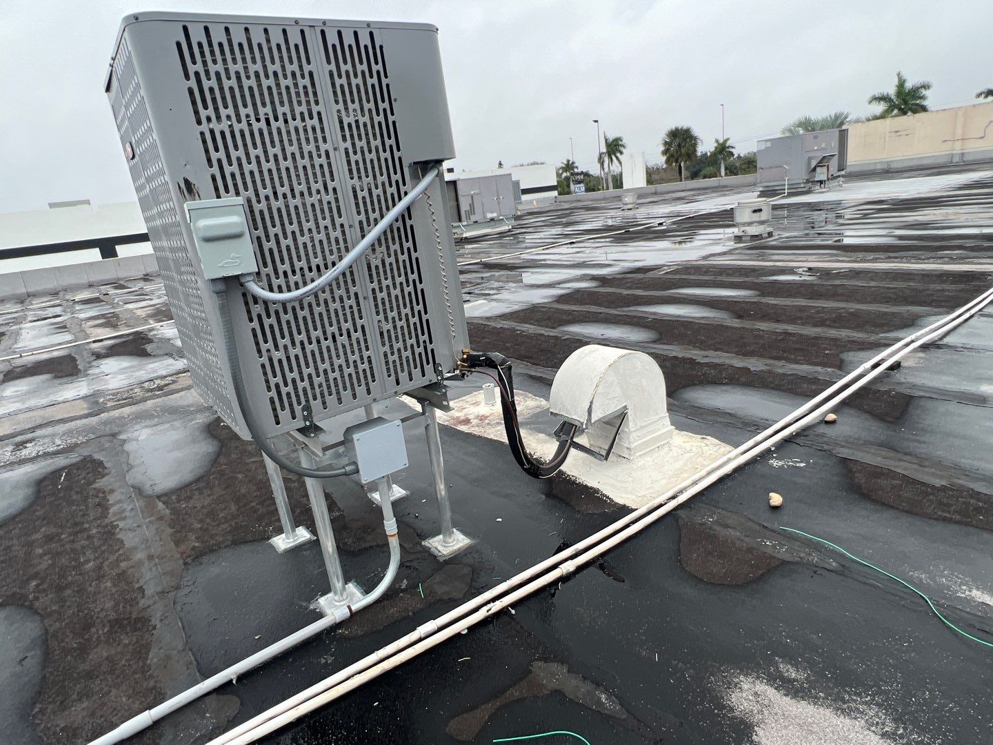 Commercial Roofing Repair using Roof Sealant by Four Peaks Roofing