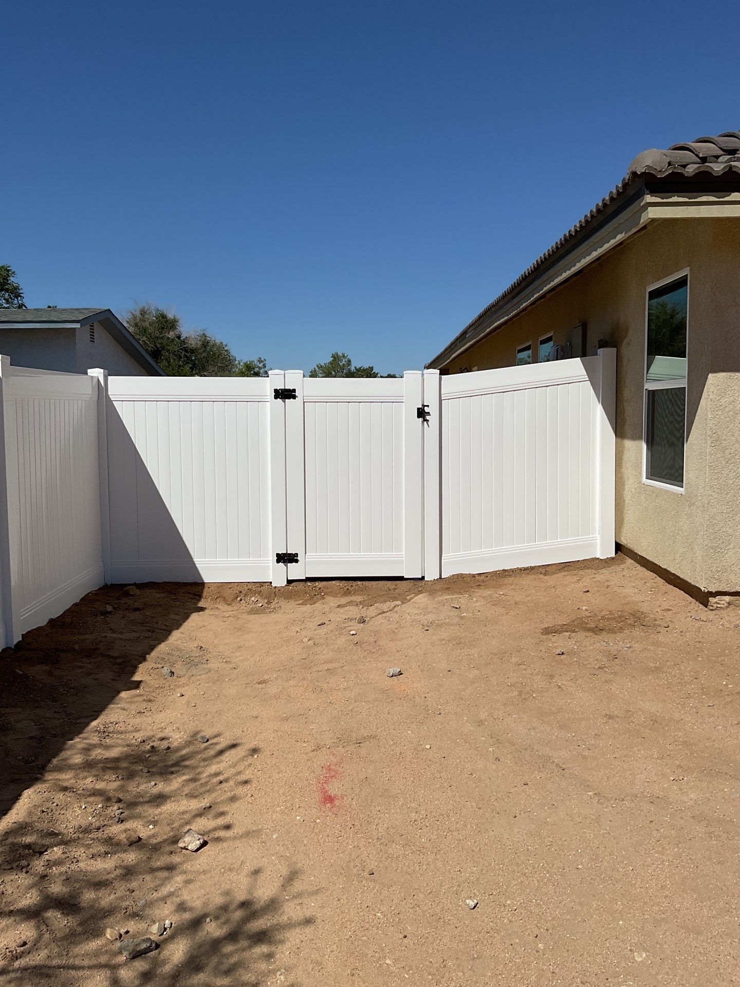 6ft White Privacy Vinyl Fence with Chain-link Fence by Fence Guys Inc.