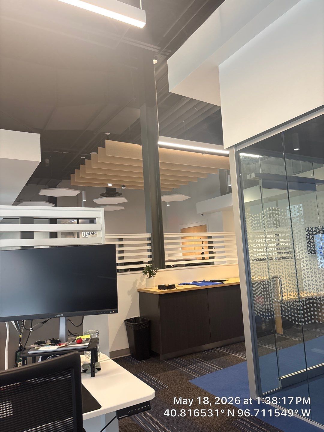 Modern Office Renovation in Lincoln Featuring Acoustic Ceilings and Glass Partitions by CompanyCam Sales Demo