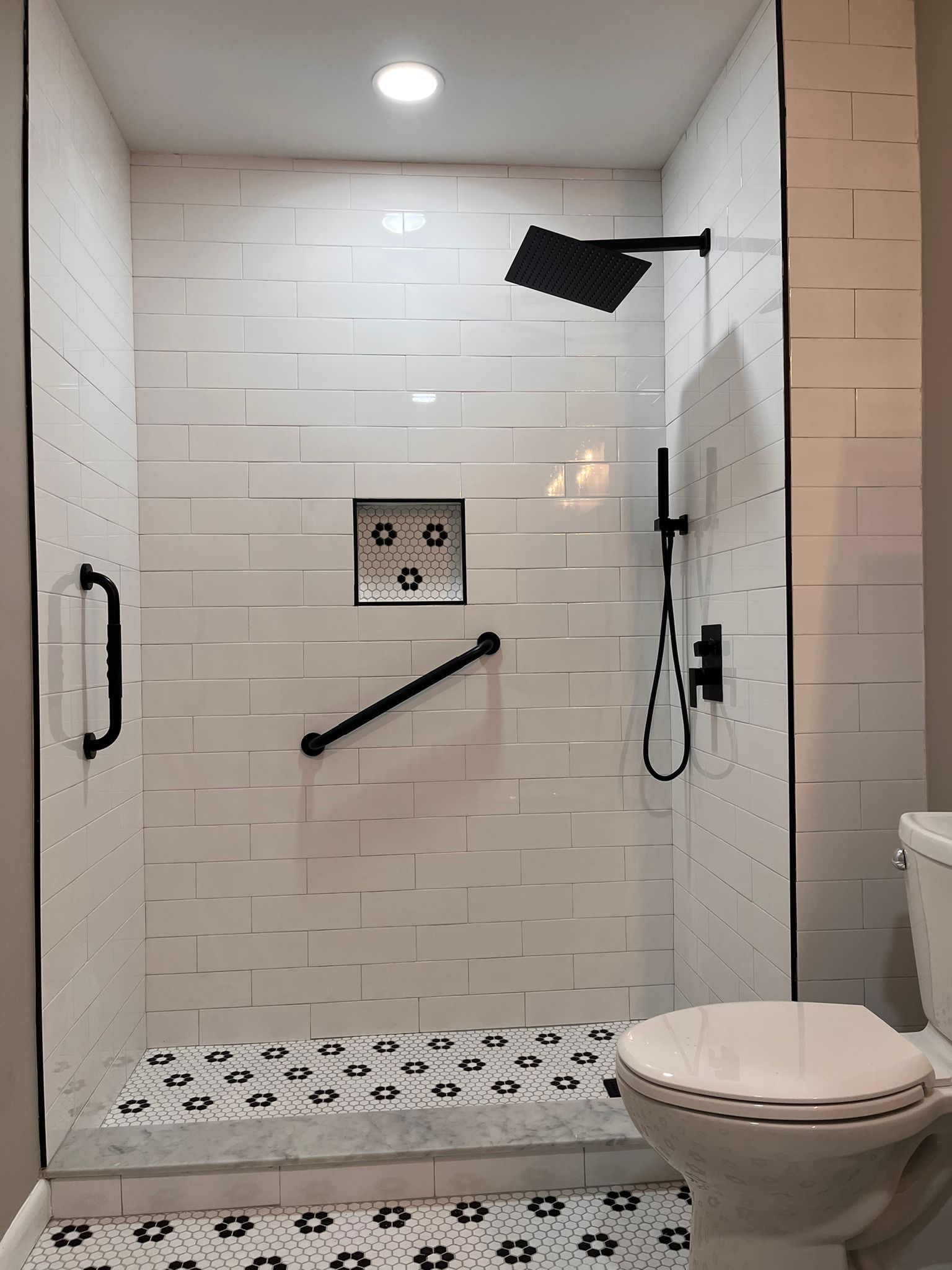 Bathroom Remodel using Tile by Home Concepts Construction
