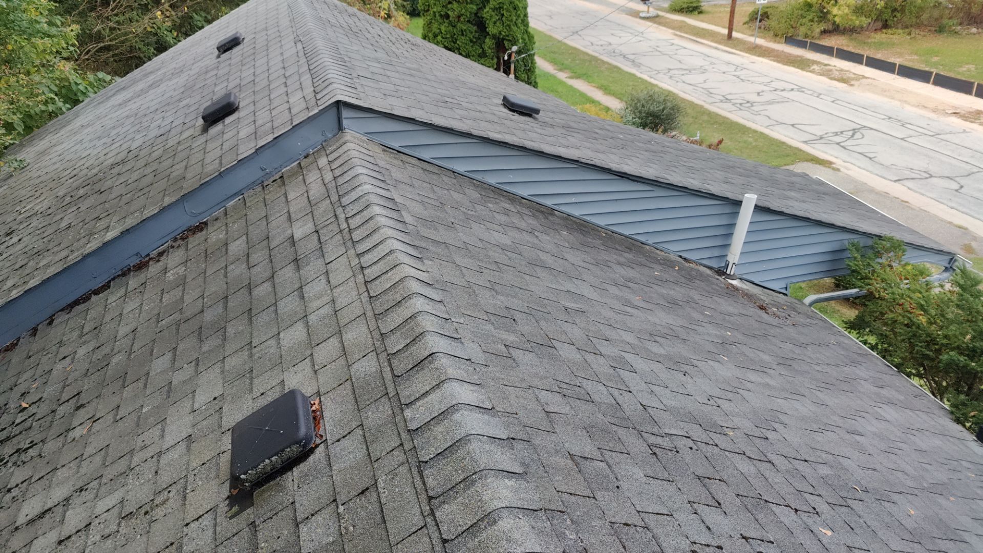 Roof Replacement using Owens Corning Midnight Plum by 180 Contractors
