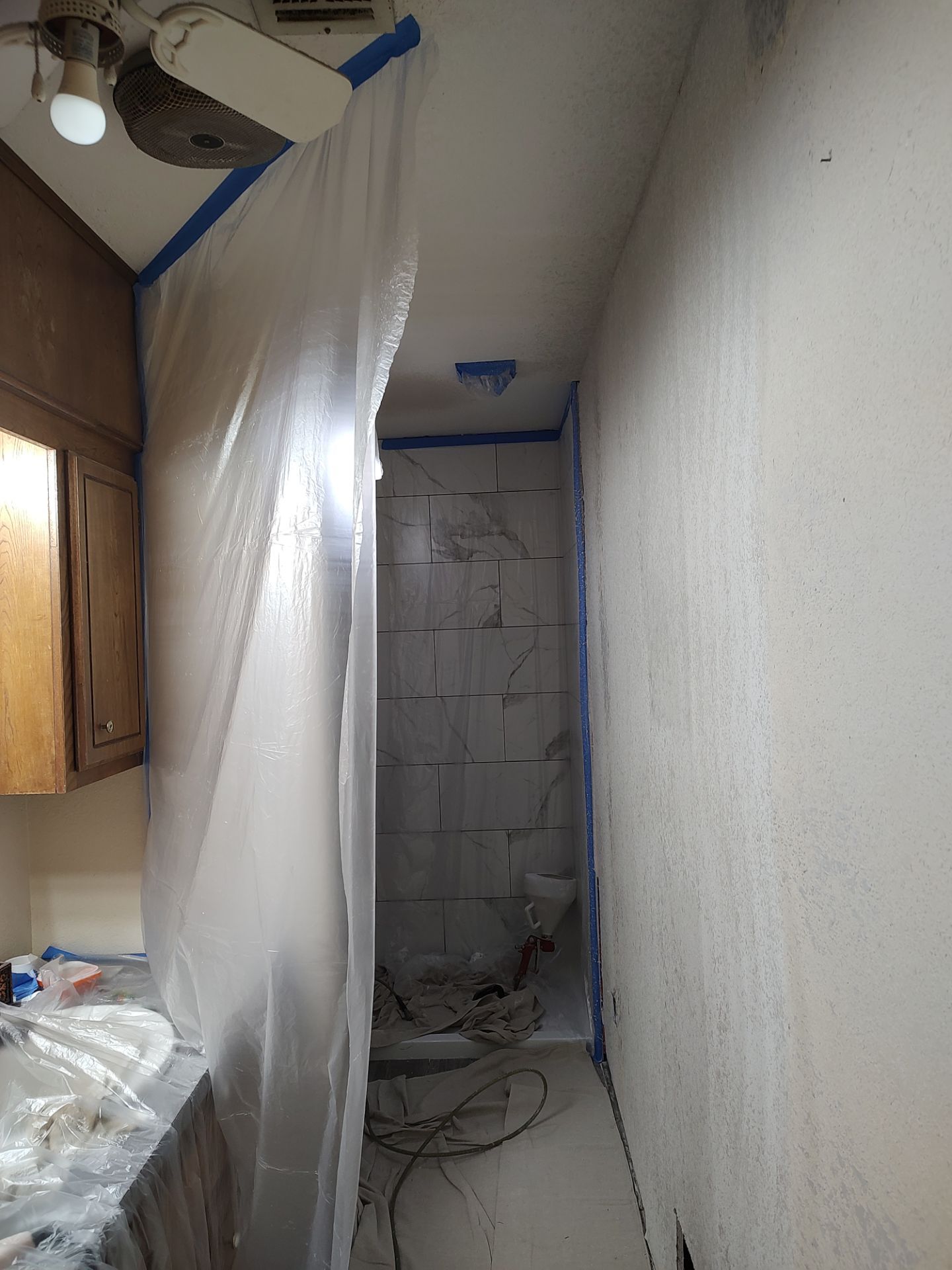 Bathroom remodel w/shower upgrade by In & Out Construction & Remodeling, LLC