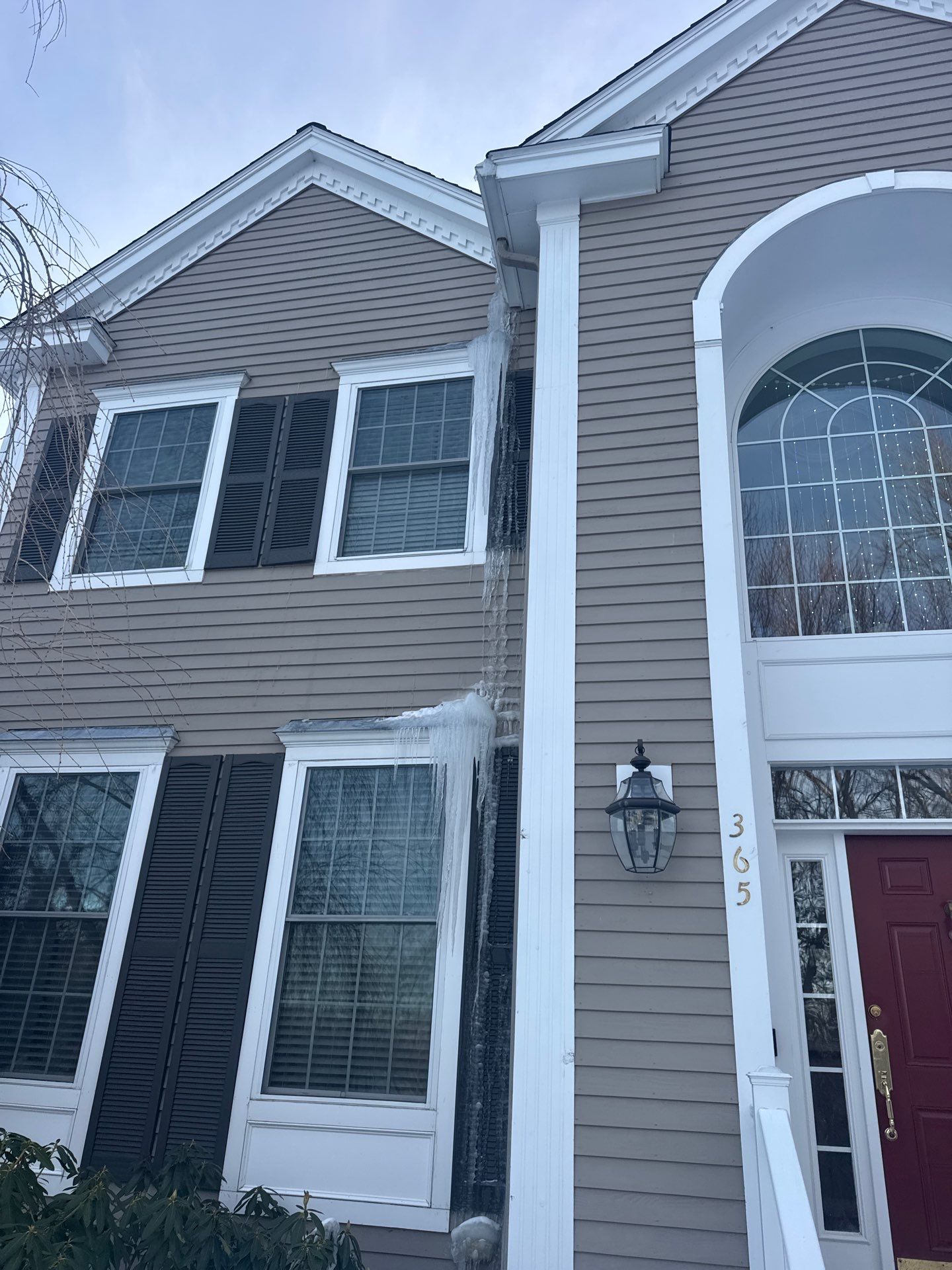 Ice Dam Removal Project in North Andover by Mighty Dog Roofing of Greater Middlesex County