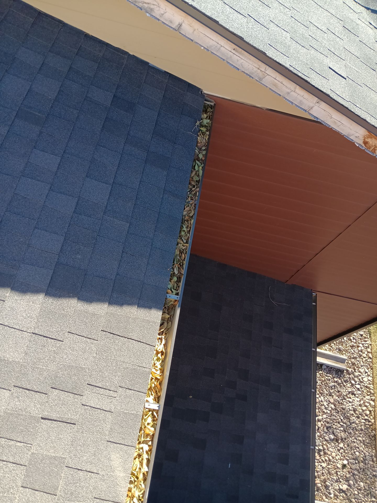 Commercial gutter cleaning Wyoming before photo with filled gutters