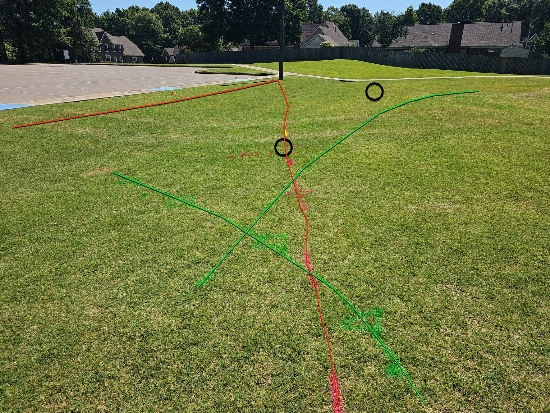 Utility Locating at a school for fence install by Alsip Locating Service, LLC