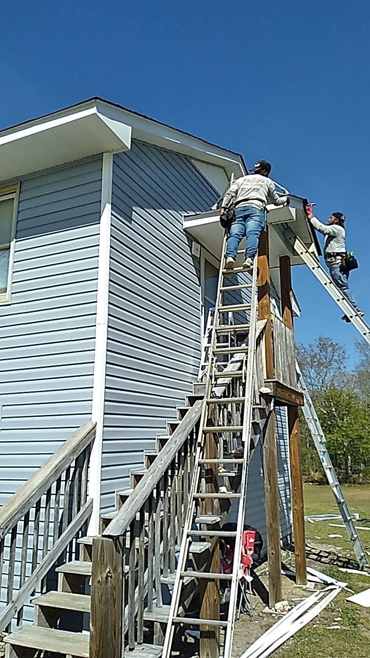 Interior and exterior renovation using Royal Building Products  by Indigo State Roofing