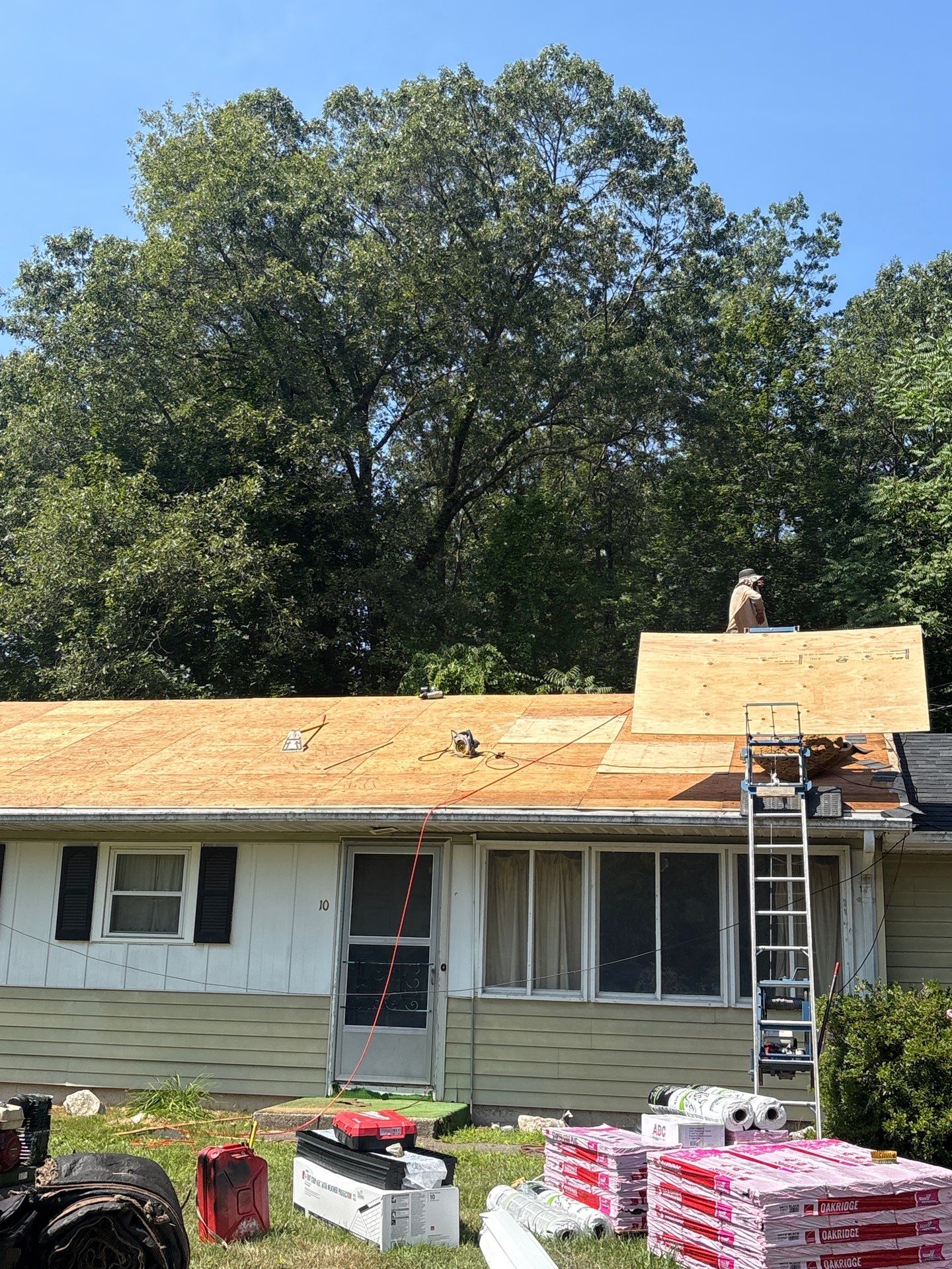 Onyx Black Roof Transformation in Maynard, MA by Mighty Dog Roofing of Greater Middlesex County