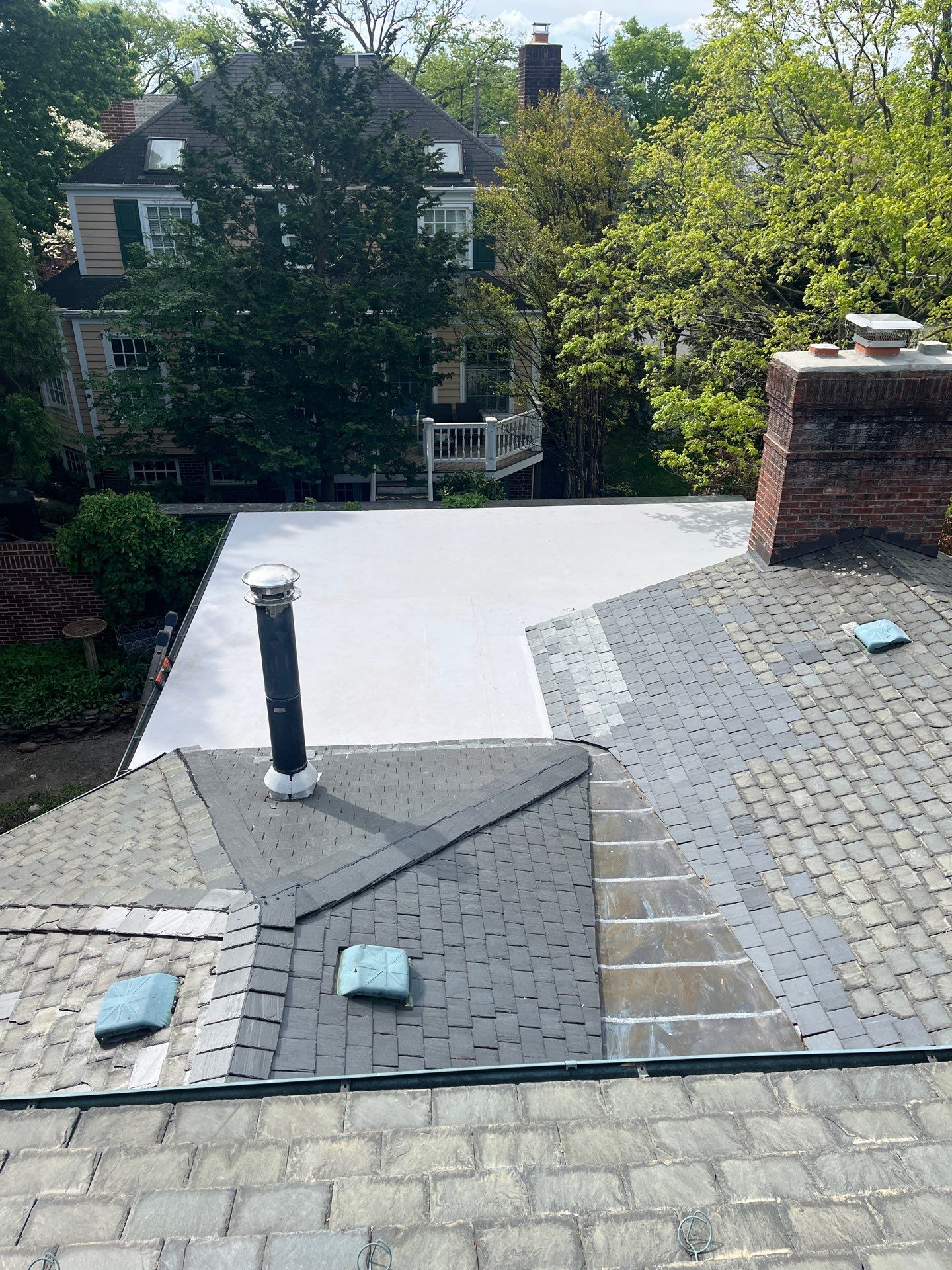 Arlington: Buckingham Slate and Carlisle Syntec TPO Roof by RM Banning, Inc.