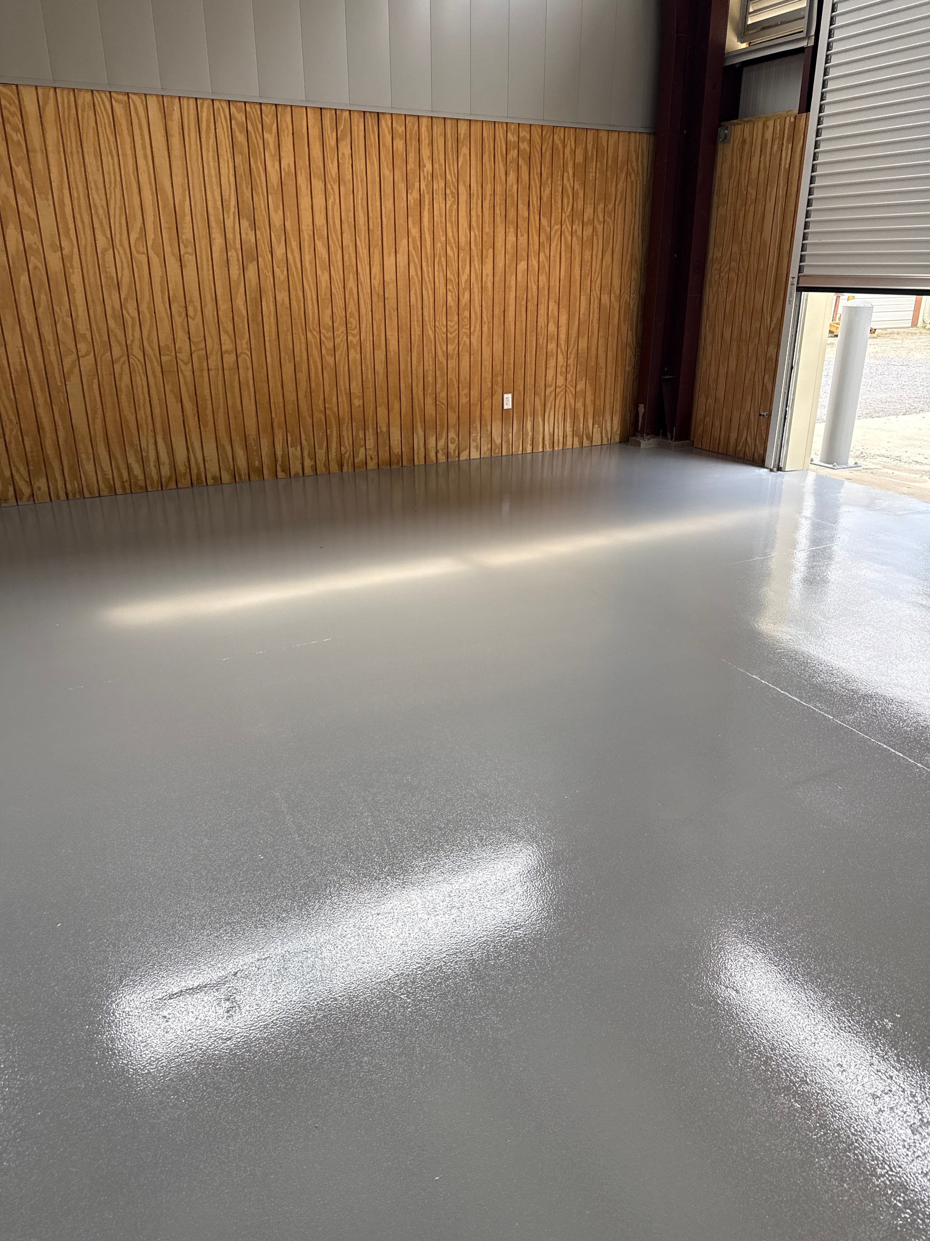Industrial Epoxy Flooring for Sandhill Crane Workshop in Gautier by Cornerstone Hard Surface Restoration 