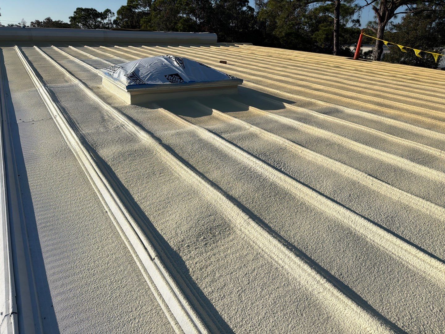 Sarasota Industrial Warehouse Metal Roof Silicone Coating Restoration by CES Roofing
