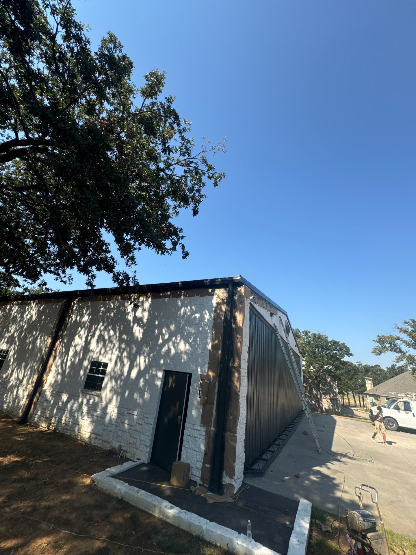 R-Panel Replacement by First Out Roofing 