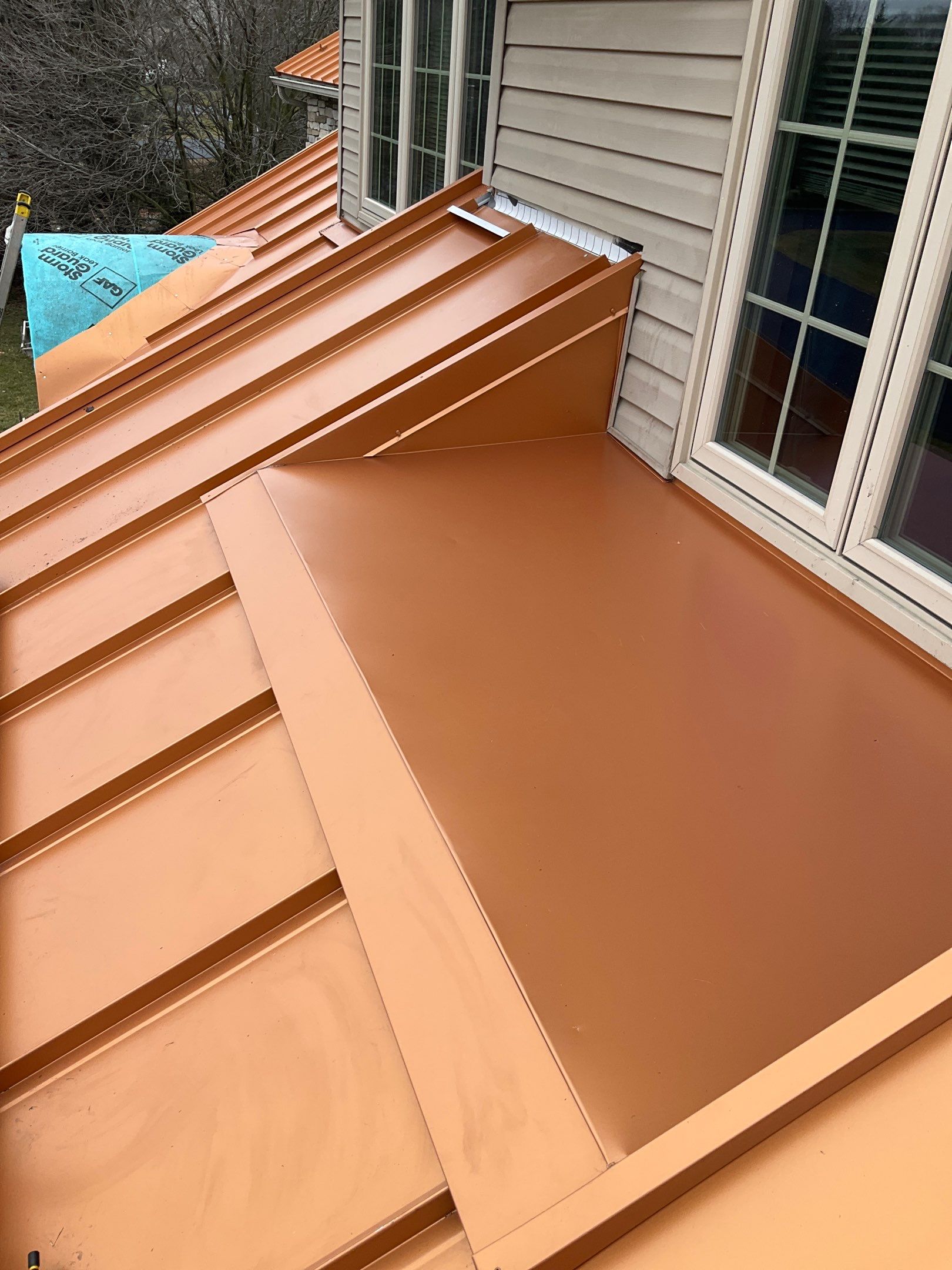 Standing Seam Roof – Copper Finish by Esh Builders