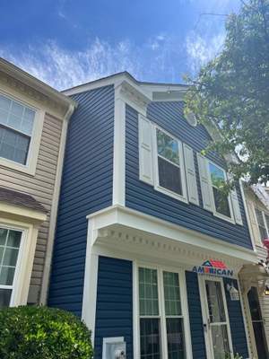 Beautiful in Blue - Mastic Siding Replacement