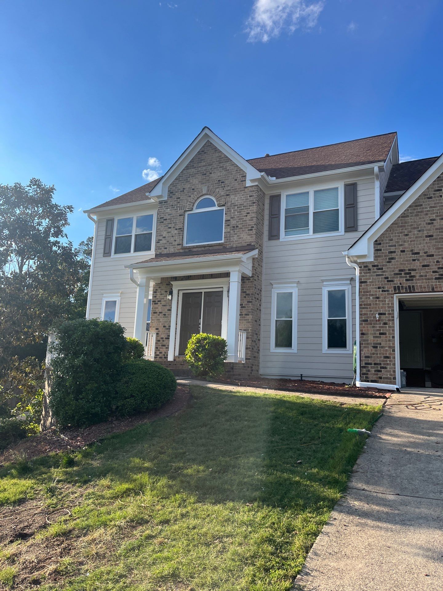 Window & Rotted Wood Replacement, Deck Stain, and Exterior Paint by Nelson Exteriors