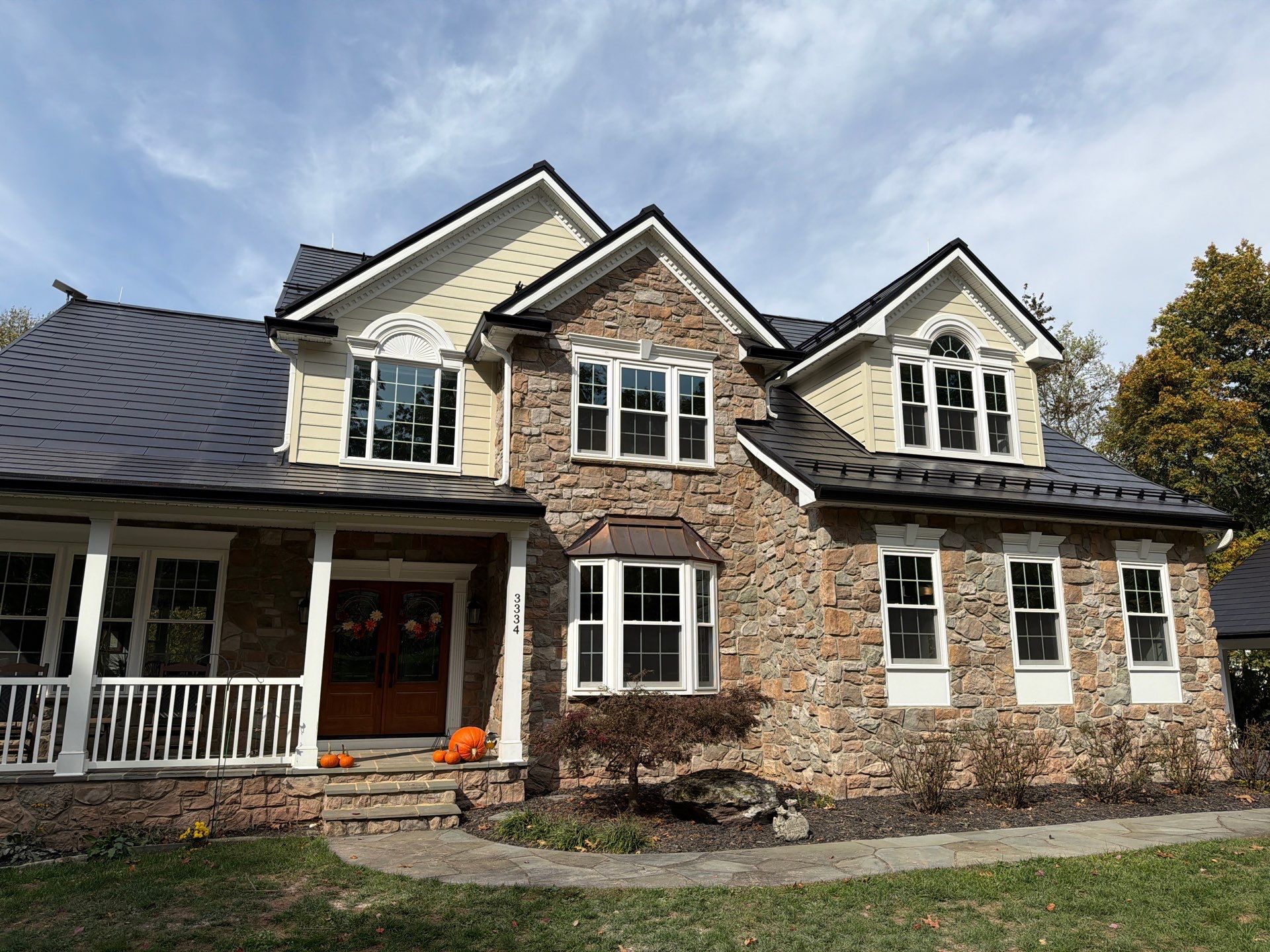 Beautiful James Hardie Siding & Tesla Solar Roof by American Home Contractors