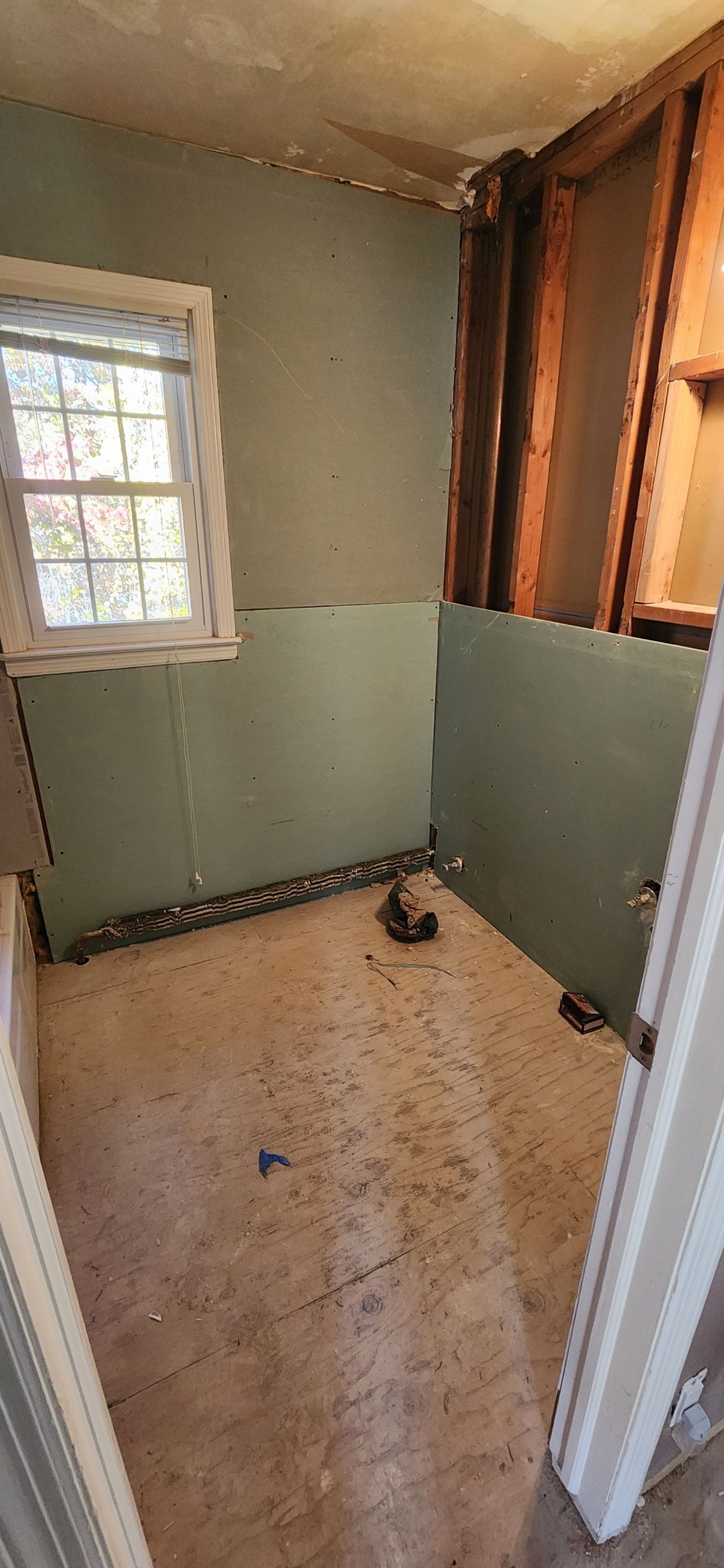 Bathroom Remodel using Porceline Tile from The Tile Shop by Footprints Floors Morristown