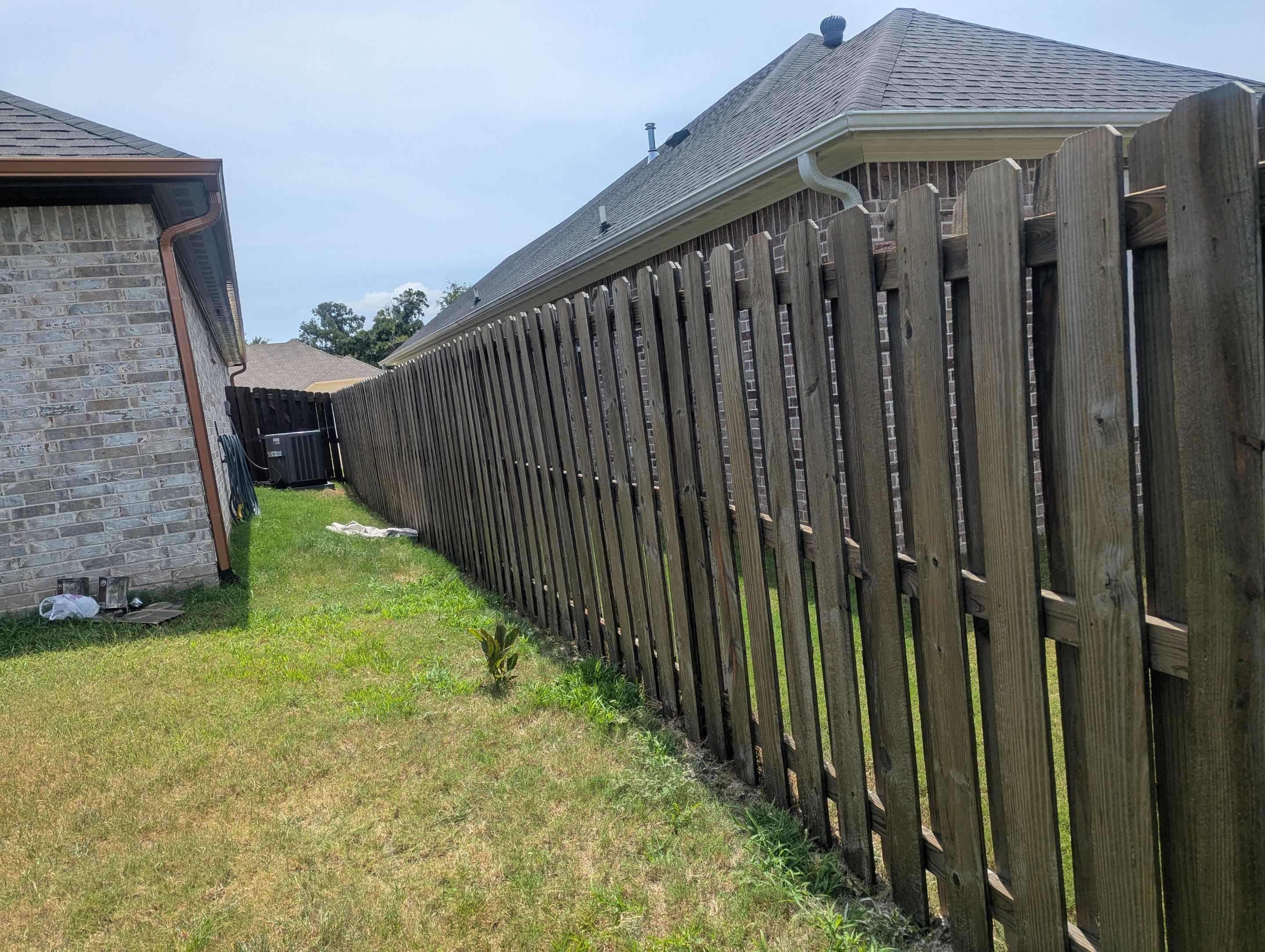 Touching Up a Fence in Whitehouse by Quality Coats Painting