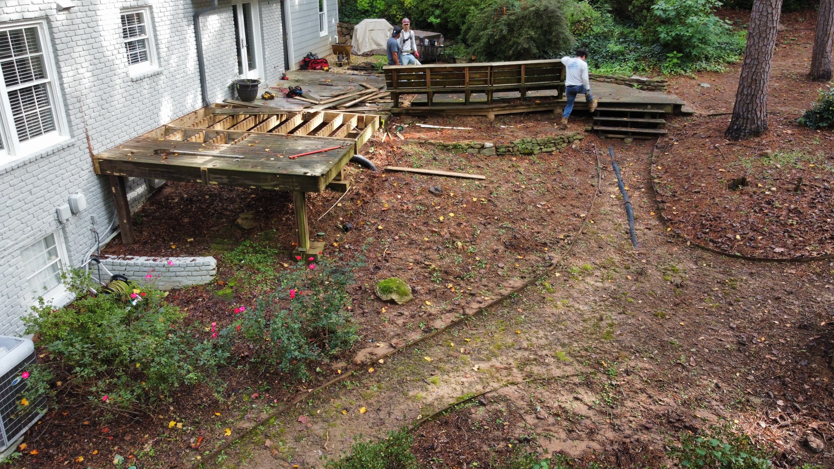 Custom Stained Wood Deck Installation with White Railings in Atlanta by Swift Home Renovations
