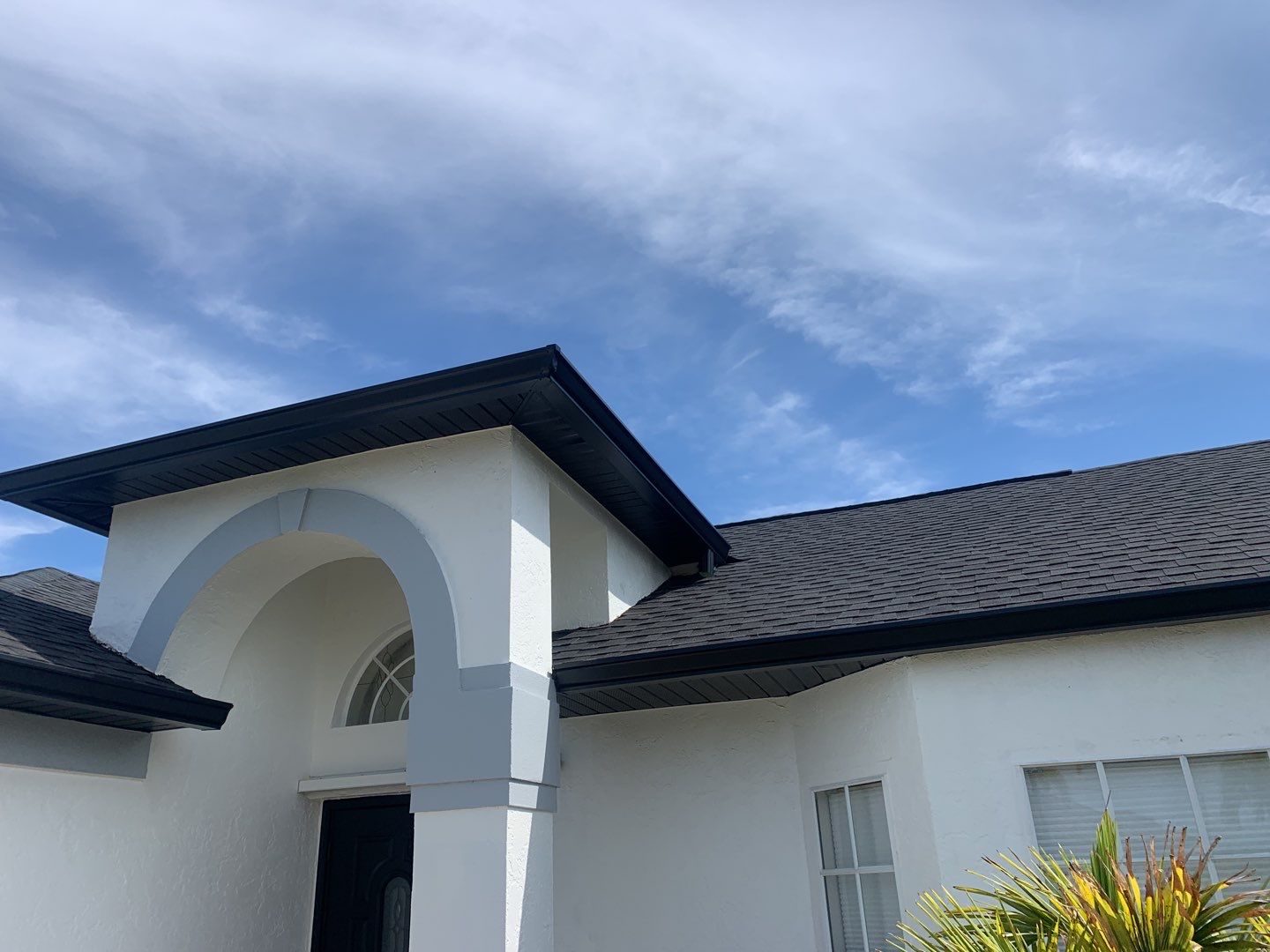 Black Seamless Gutters for Modern Cape Coral Homes by Gutter Professors