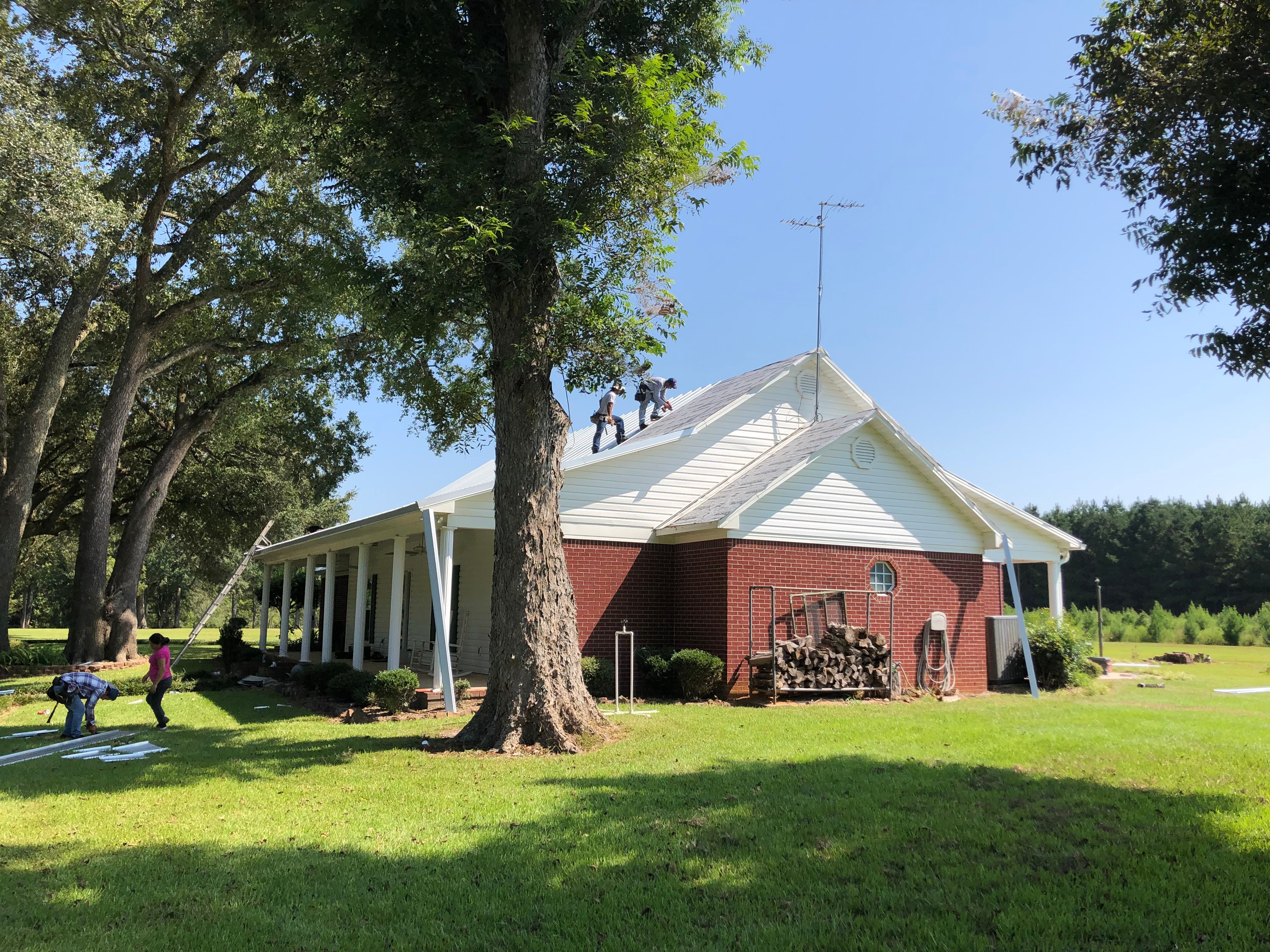 Residential Roofing Installation using Metal roofing by American Roofing & Construction LLC