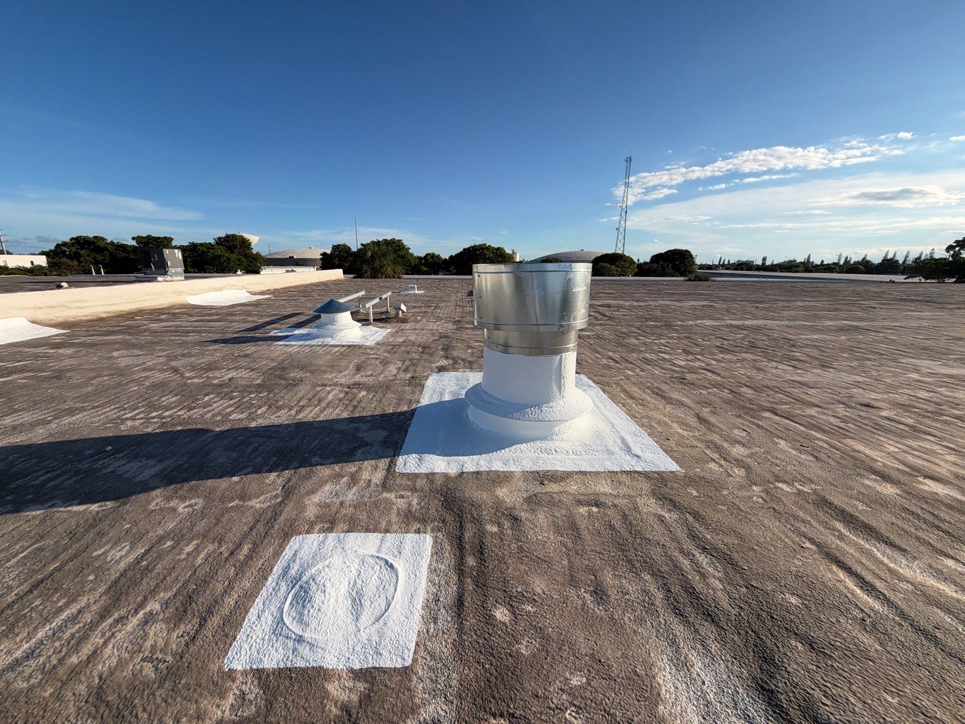 Commercial Roof Restoration and Ventilation Upgrades in Deerfield Beach by Roof King LLC