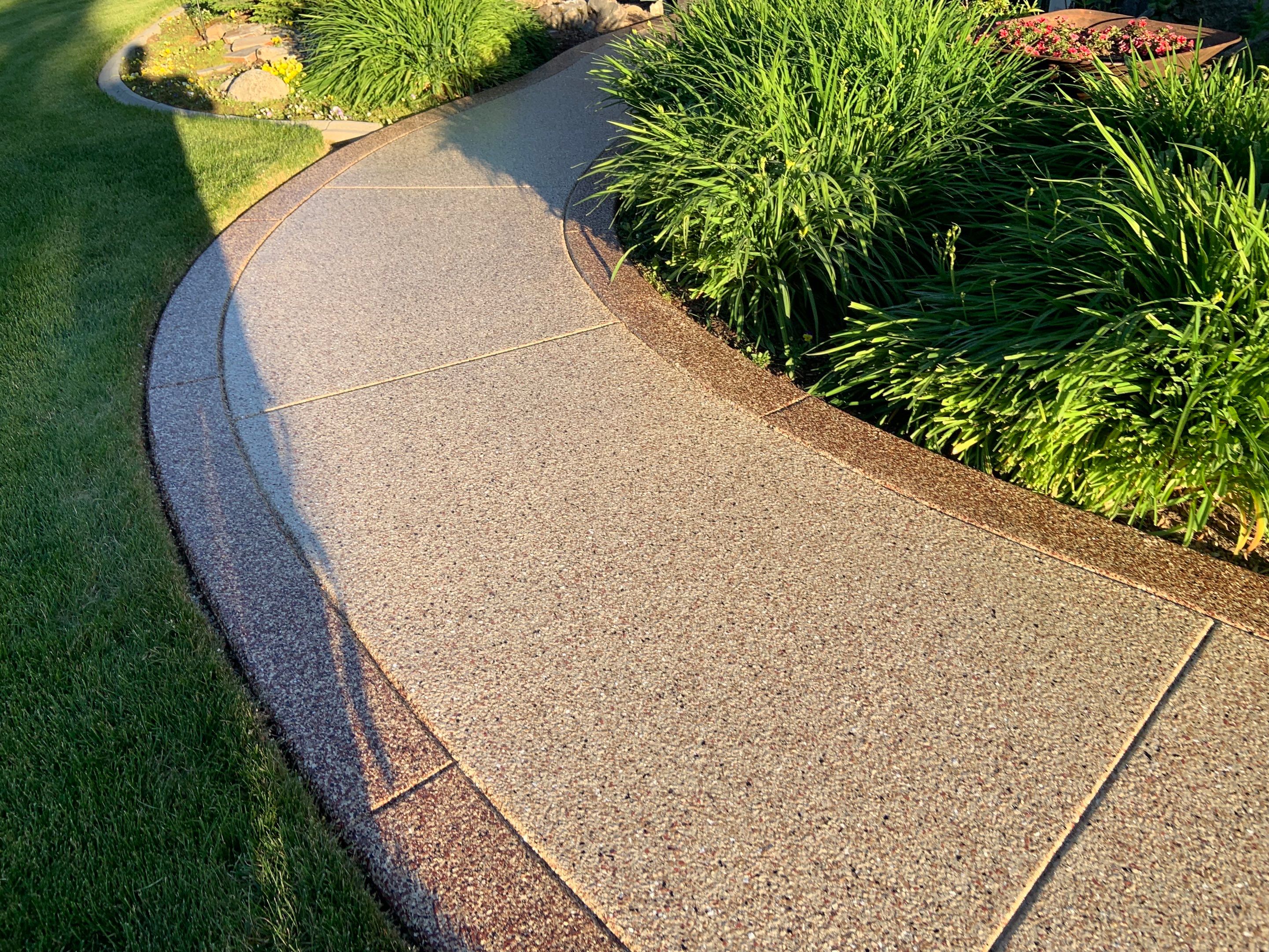 Driveway using Pecan and Chestnut Trim by Croc Coatings, LLC