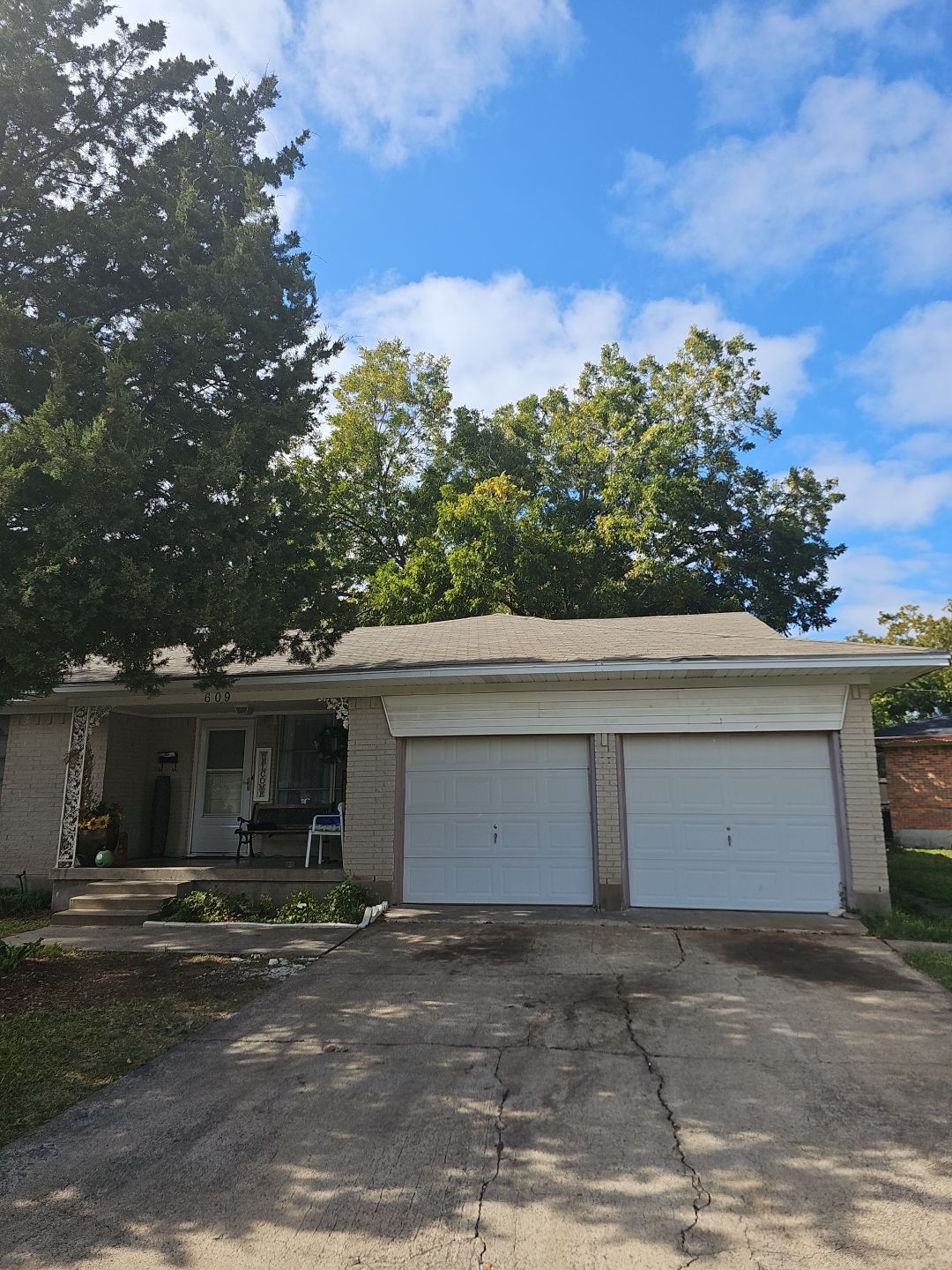 "Full Roof Replacement Due to Hail and Water Damage – Before & After" by road roofing llc