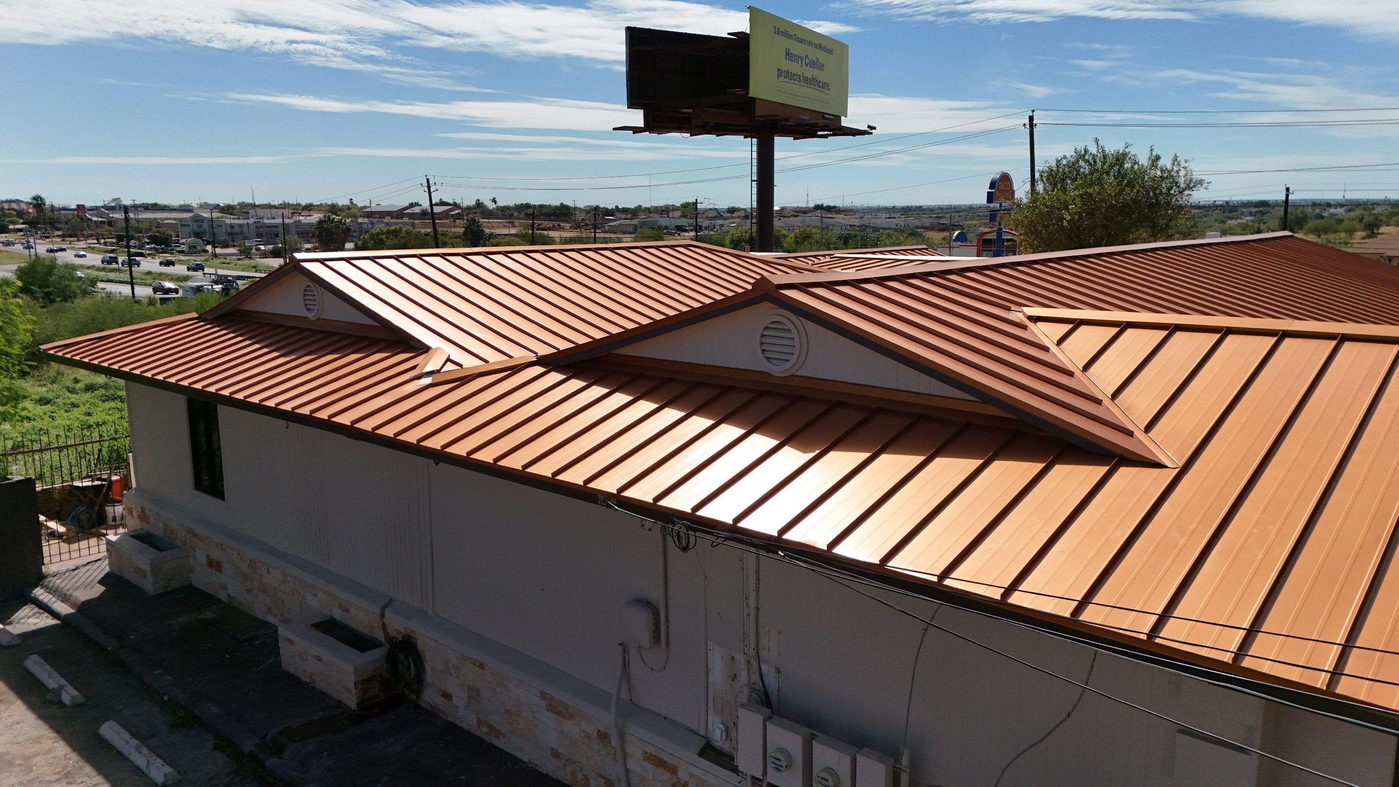 Copper Standing Seam Metal Roof Installation for Laredo Medical Clinic by JM Flores Roofing & Construction, Inc