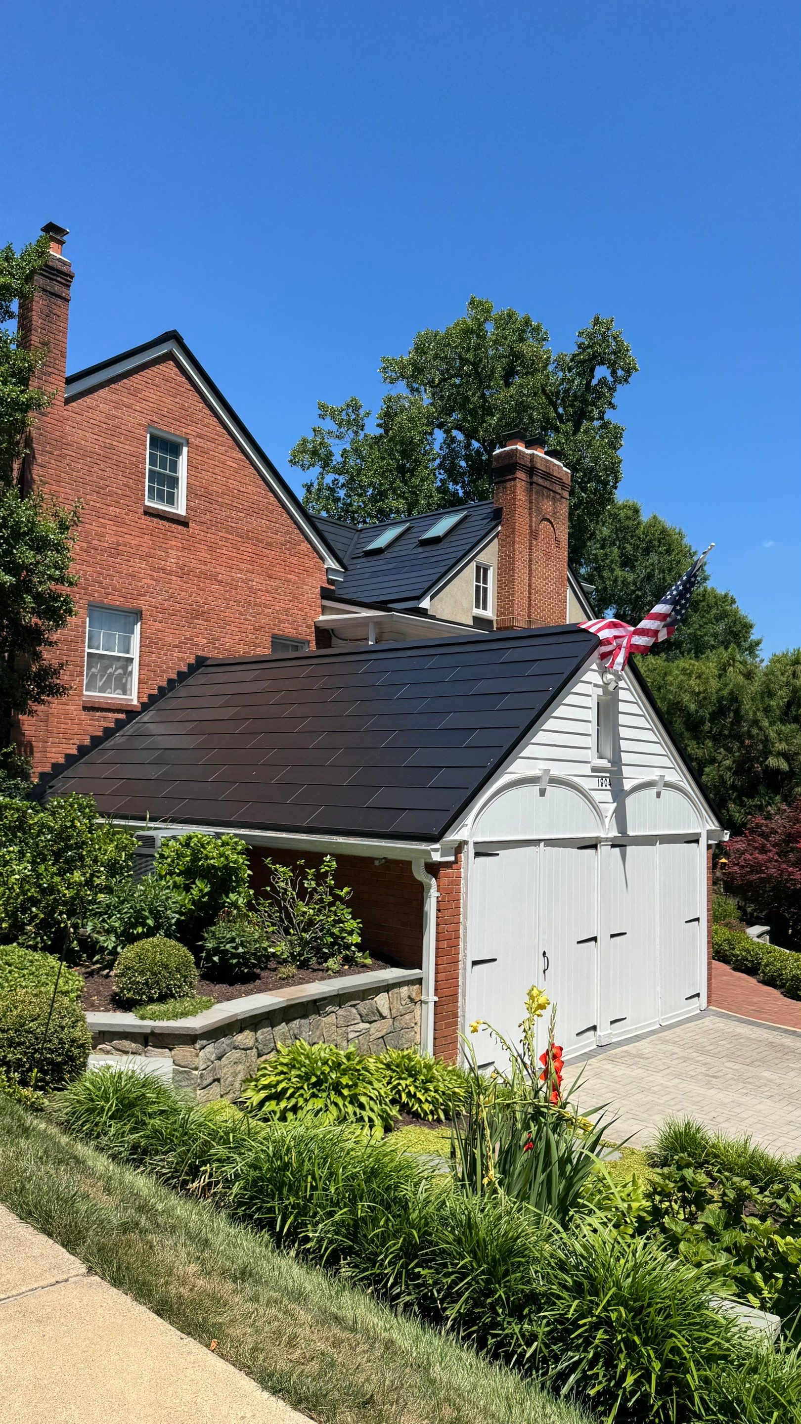 Sleek Tesla Solar Roof + Powerwall Installation | Alexandria, VA by American Home Contractors