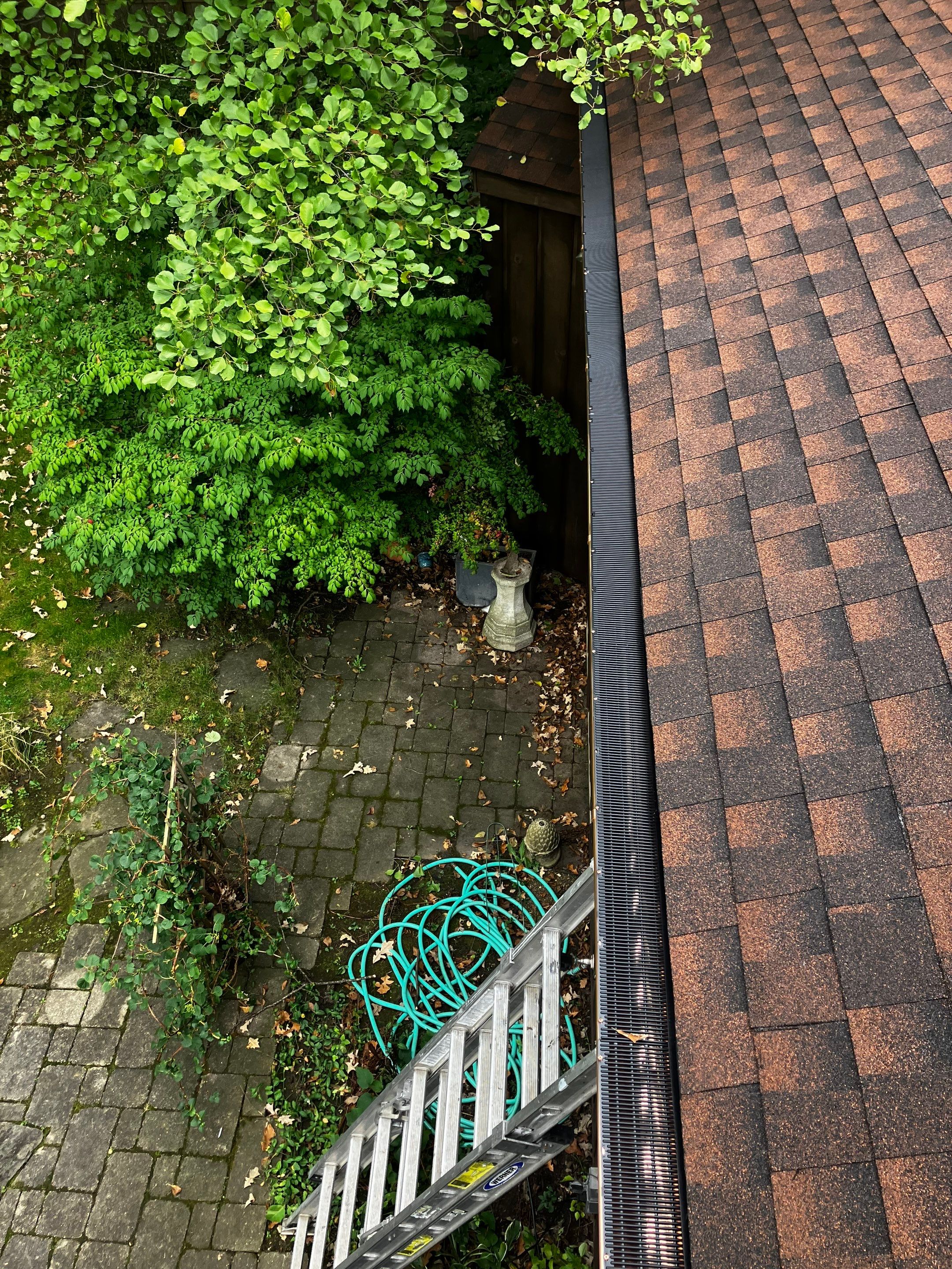 Asphalt Roof Replacement with Half Round Copper Gutter Installment  by Custom Installations