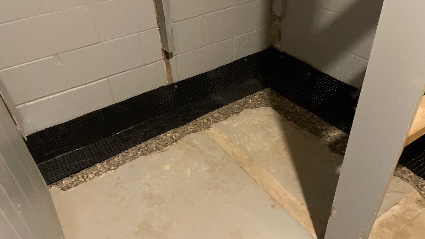 Drain Tile, Sump Pump & Buried Discharge in Columbia Heights by Waterproofing Northeast