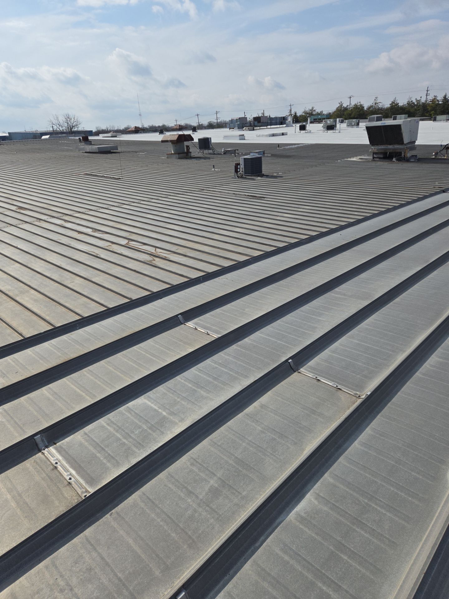 Commercial Metal and Flat Roof Repairs in Mason, Ohio by Level Up Roofing and Restoration Services LLC