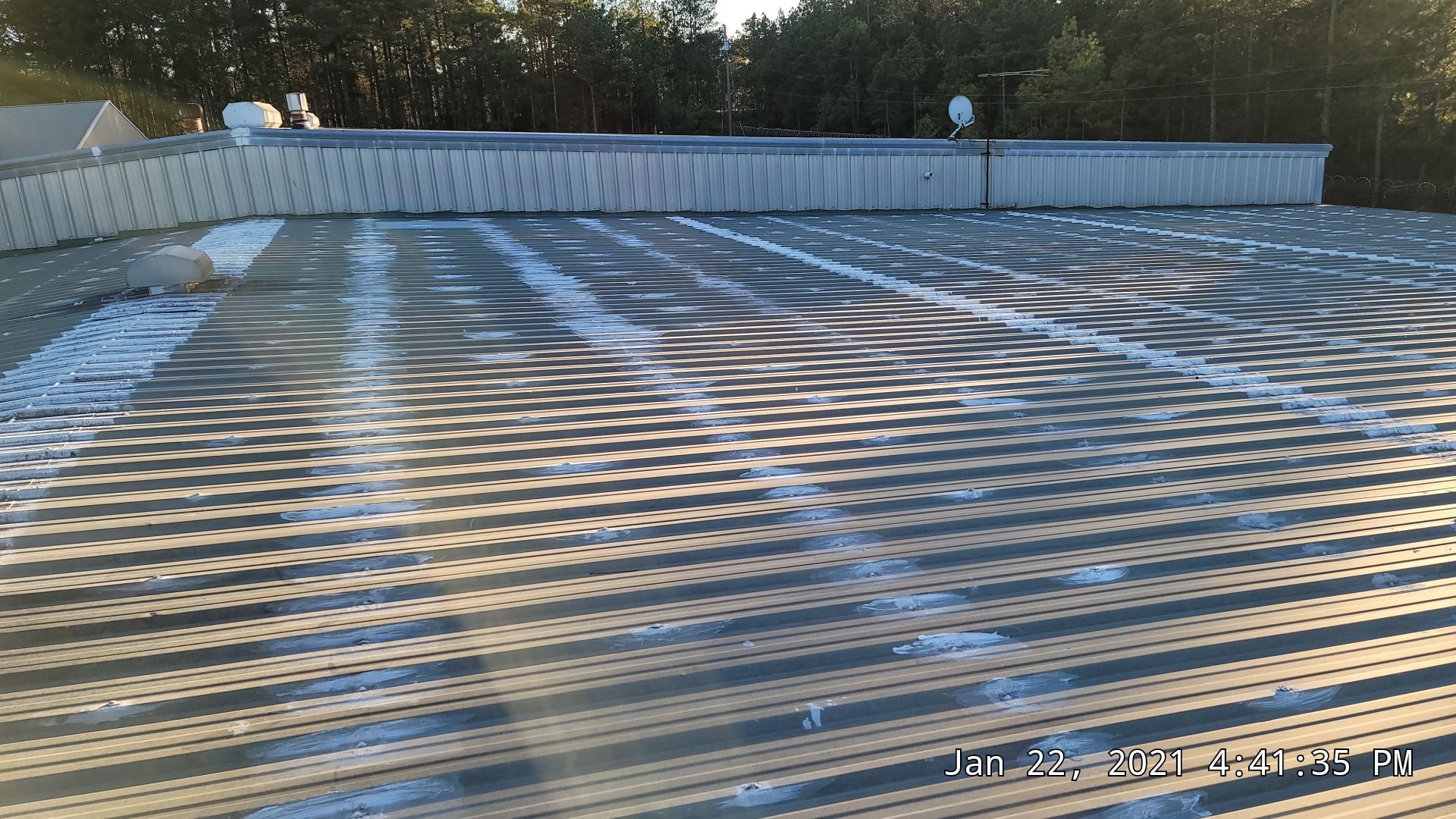 Commercial Roofing Installation using Aldocoat Coatings by Hostetler Roofing