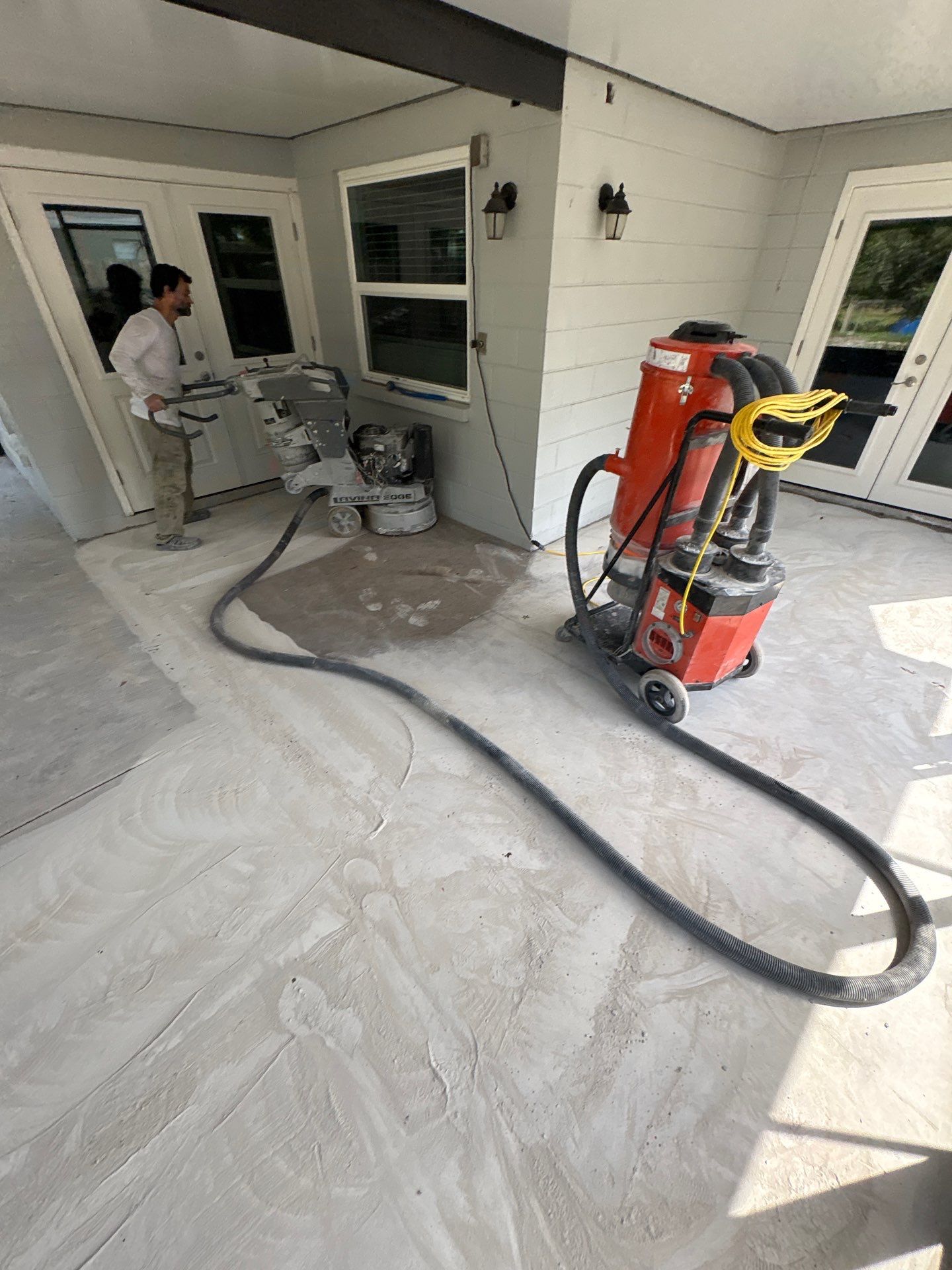 Screened-in Lanai Polyaspartic Floor Coating Installation in Riverview by Performance Floors & Coating