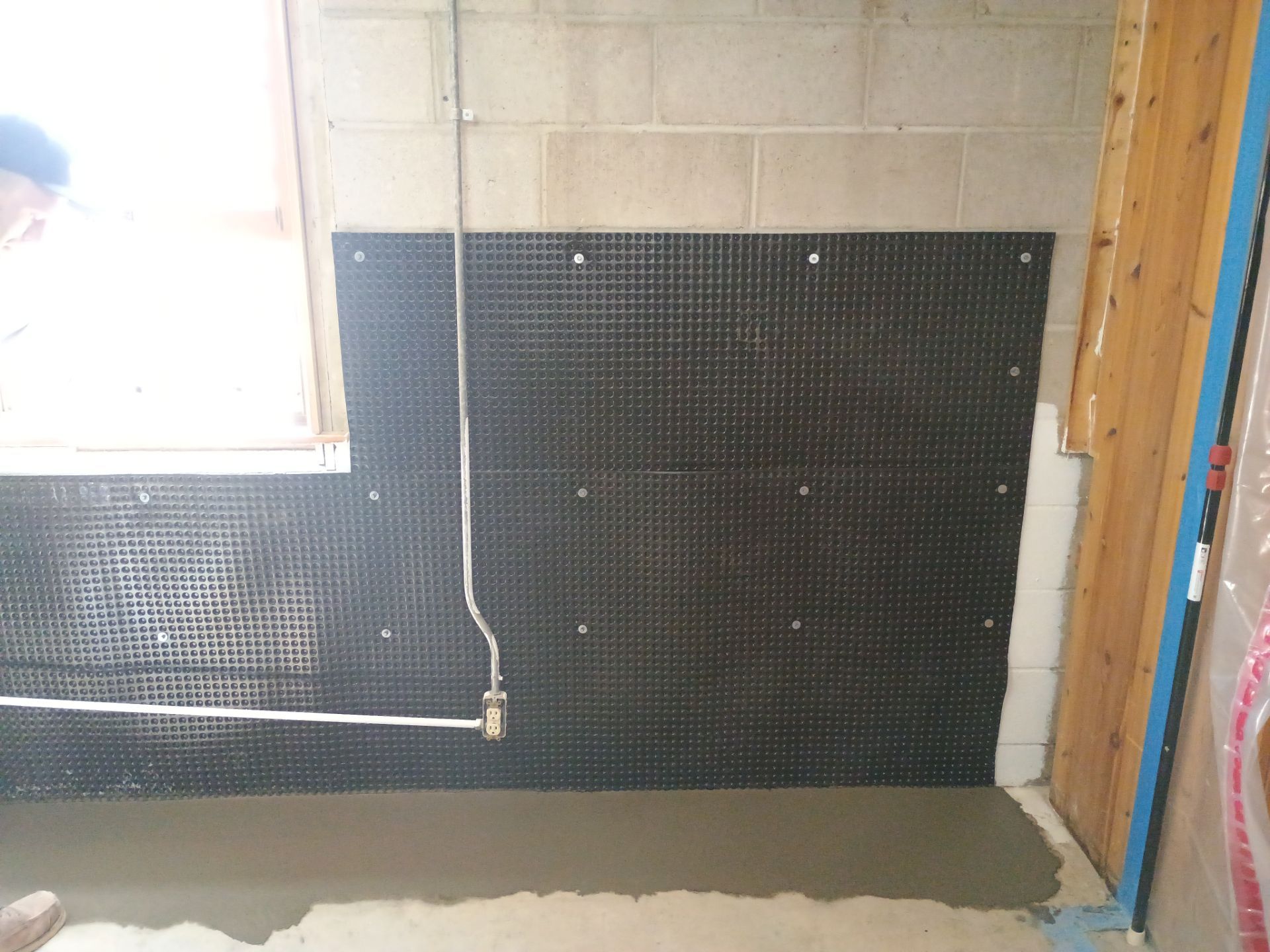 Interior Drain Tile & Foundation Crack Repair in St. Anthony, MN by Waterproofing Northeast