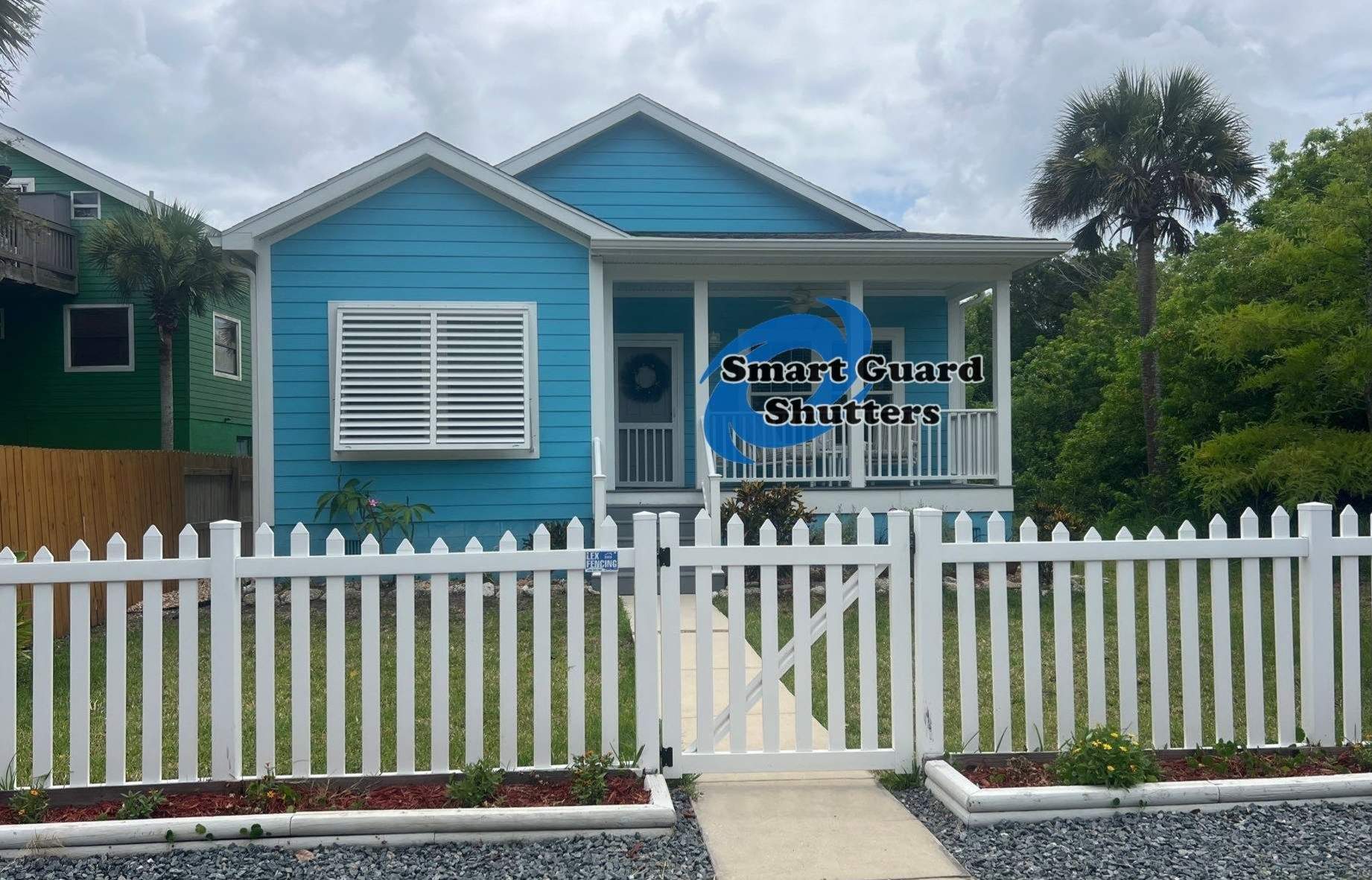 Impact Bahama Shutter in Signal White by Smart Guard Shutters