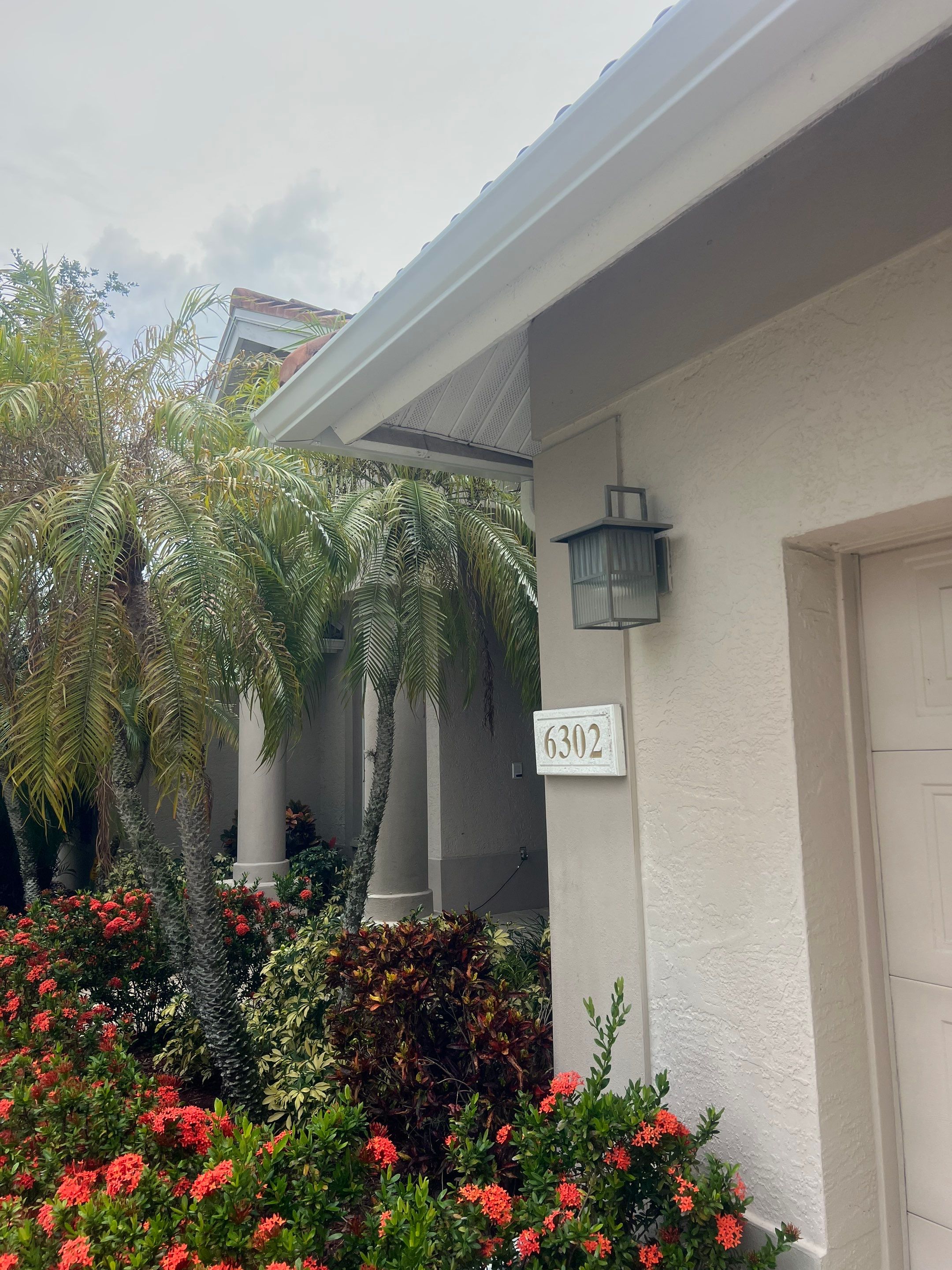 6-inch White Seamless Gutters Installation by Gutter Professors