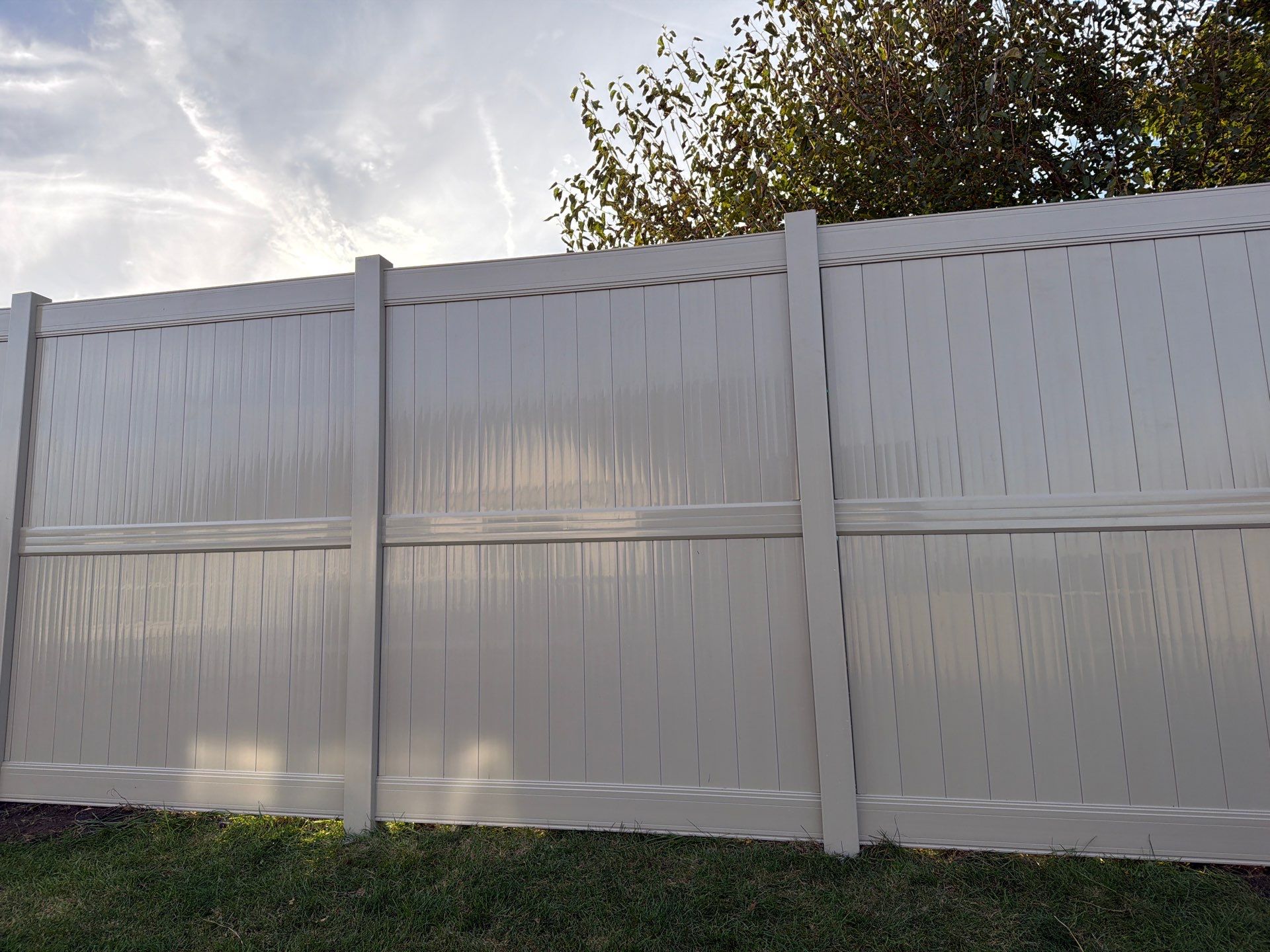 Adobe Vinyl Privacy Fence and Gate Installation in Cedar Falls by Perfect Picket Fence and Stain