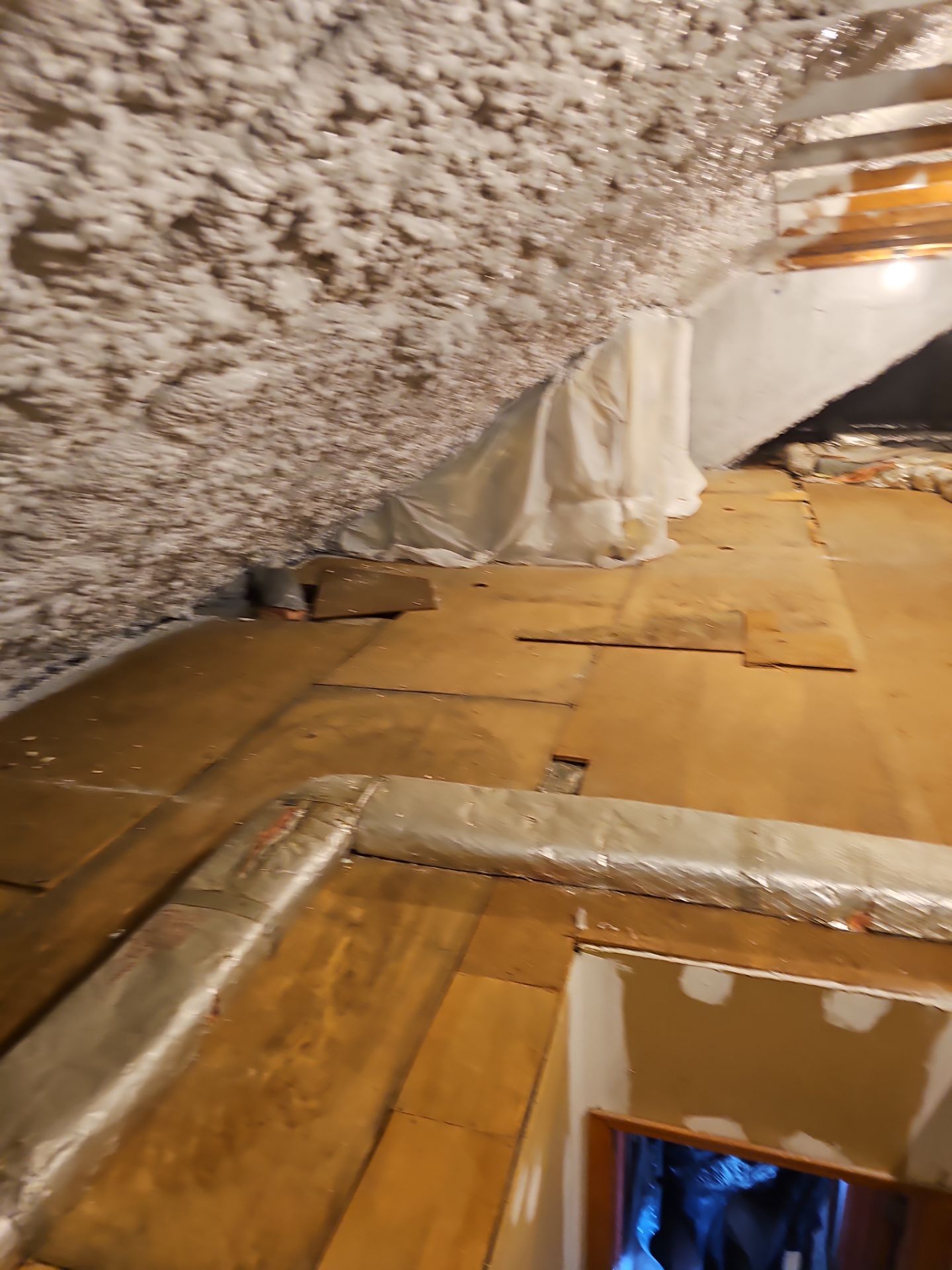 Attic Retrofit using open cell spray foam by NYS Foam & Energy