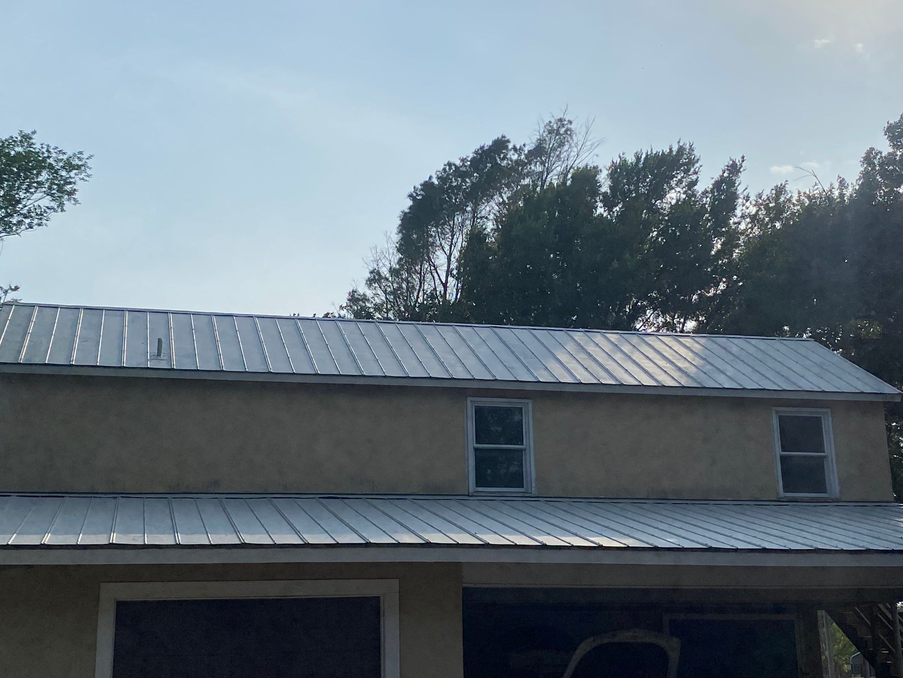 Metal roof clean & coating by Cool Roofs