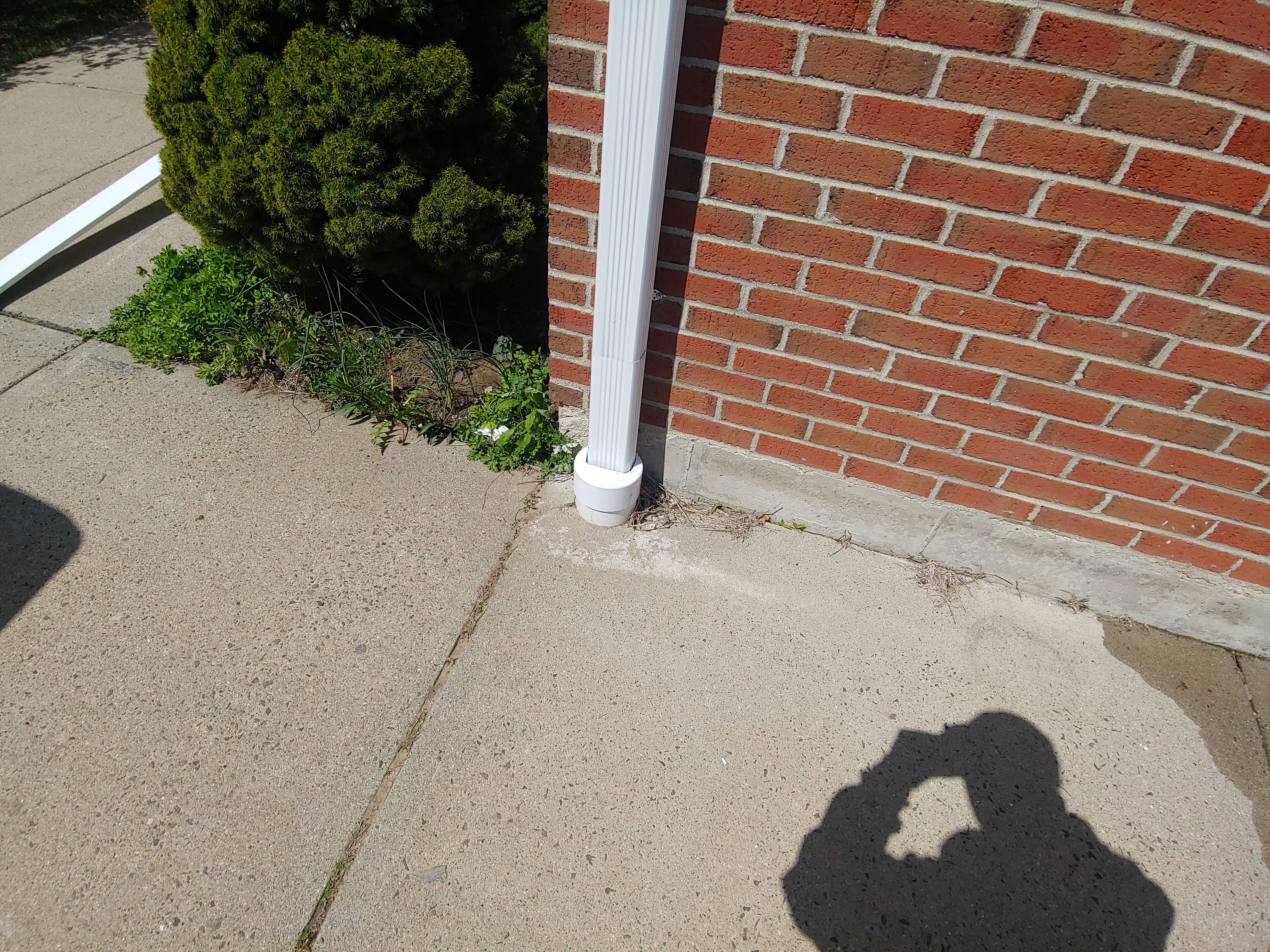 Commercial Roofing Installation using EPDM with white gutters by A Plus Exterior