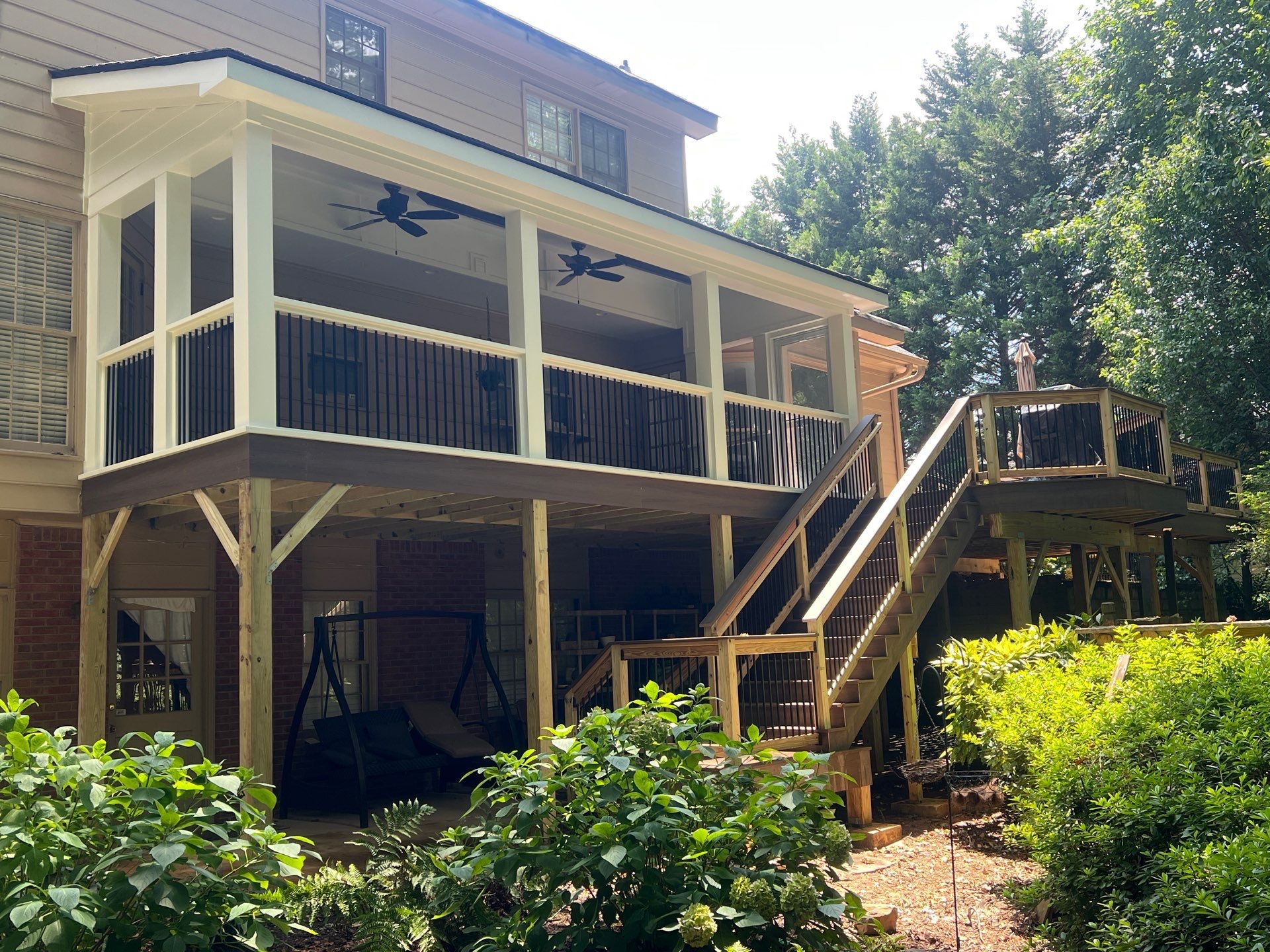 Deckorators Voyage Deck and Shed Style Covered Porch Build with Drink Rail by Nelson Exteriors 