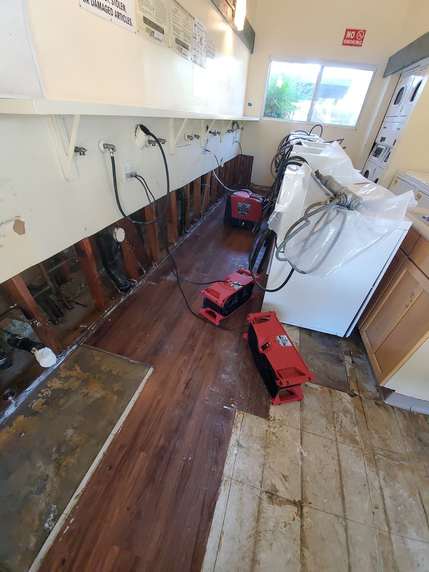 Laundry Room Water Restoration & Rebuild in Irvine by One Stop Source