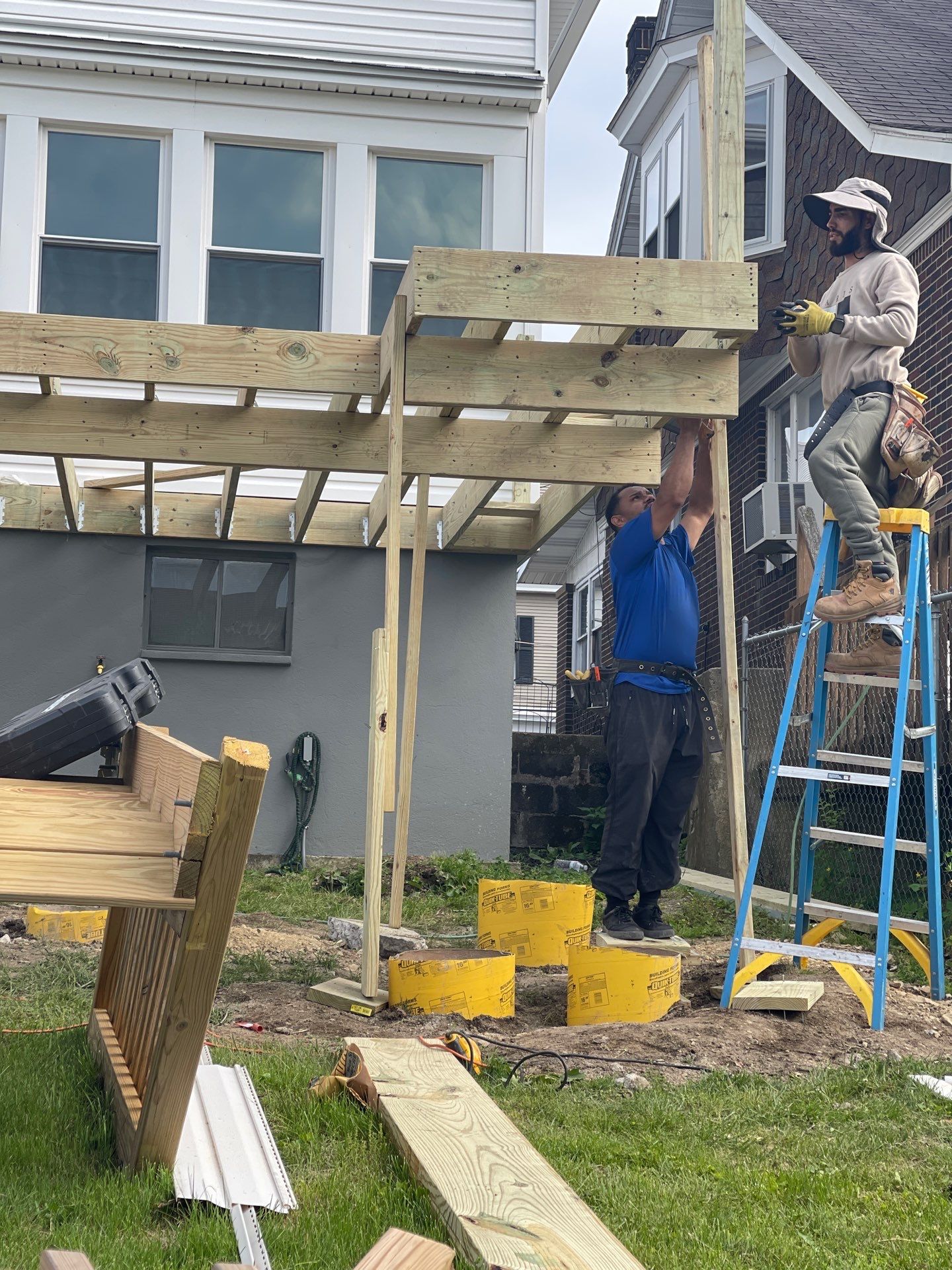 Pressure-Treated Wooden Staircase and Concrete Footing Installation in Schuylkill Haven by Herts Roofing & Construction